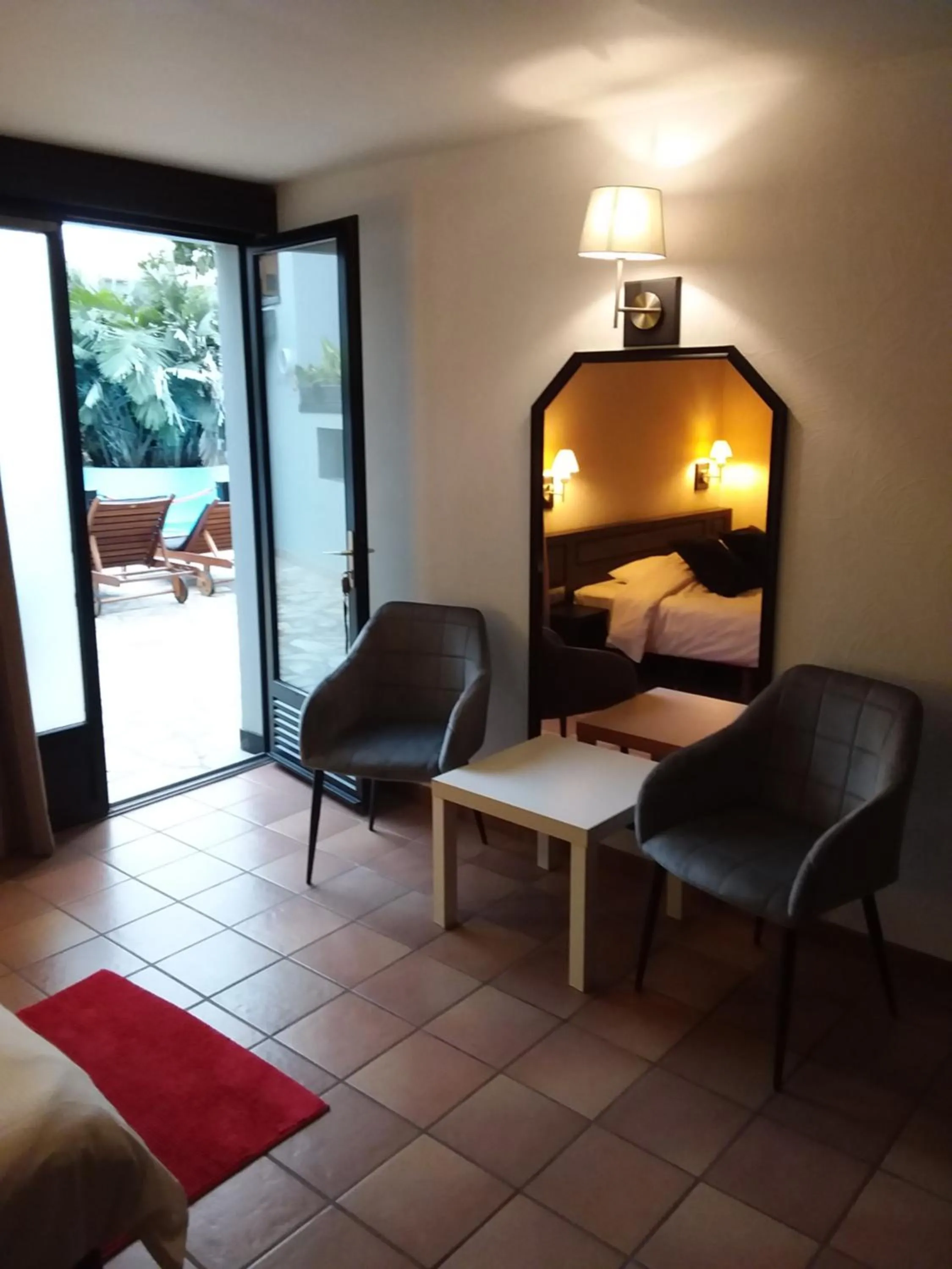 Seating area, Bed in Tropical Hotel