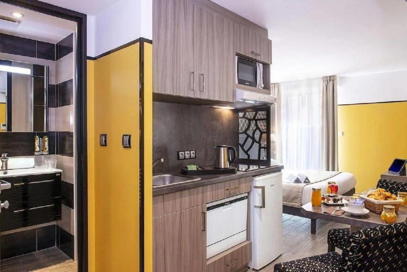 Bedroom in Unique Hôtel Résidence & Spa