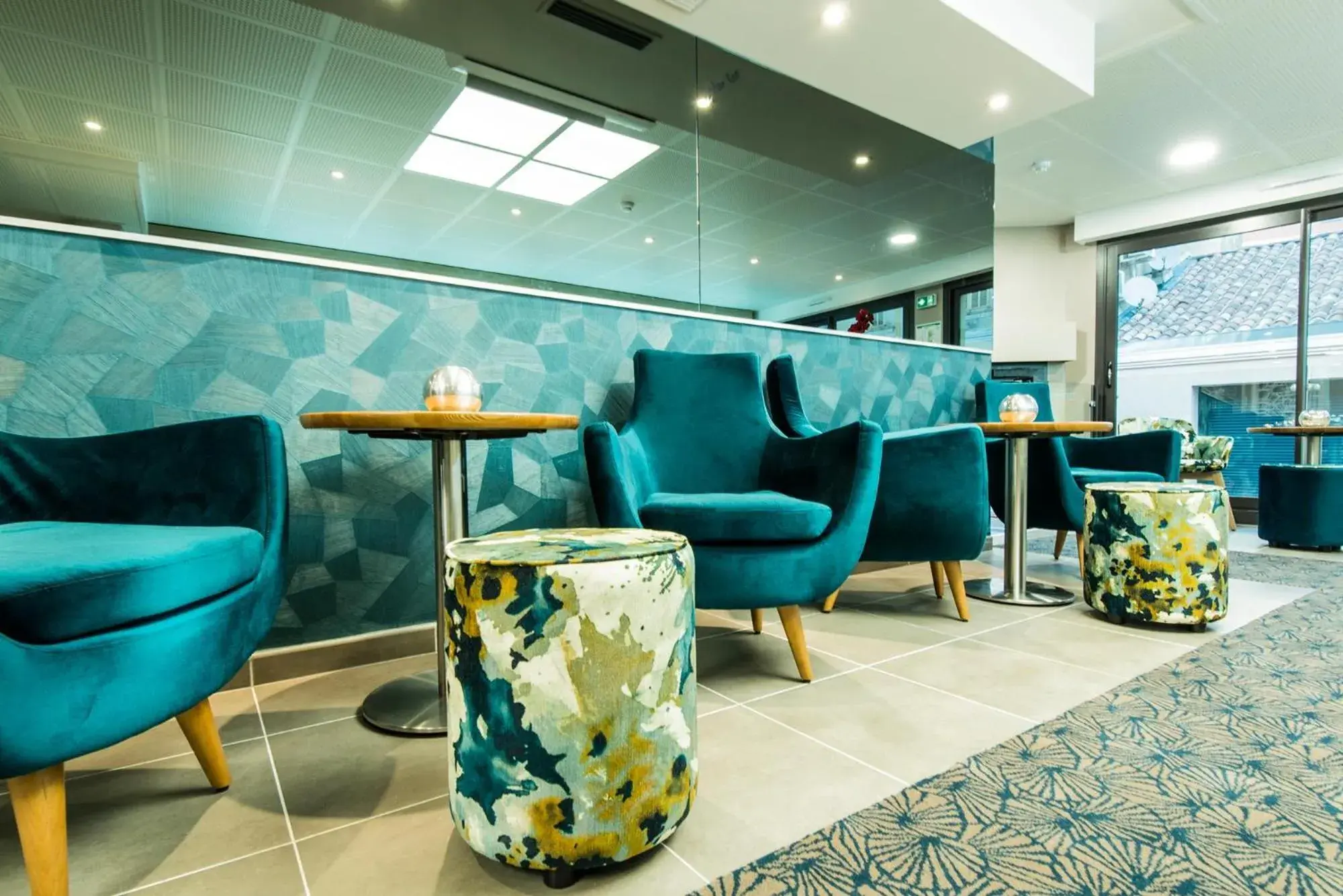 Living room in Unique Hôtel Résidence & Spa Living room in Unique Hôtel Résidence & Spa