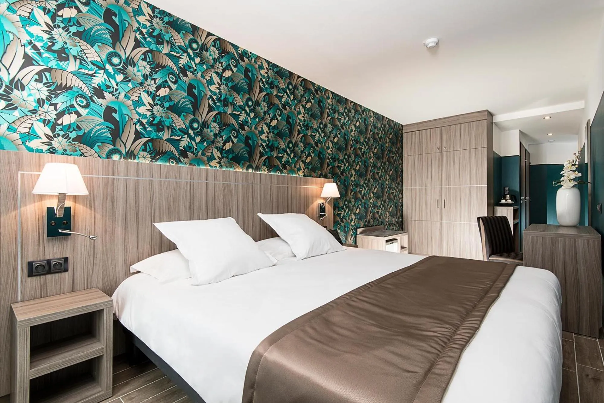 Bedroom, Bed in Unique Hôtel Résidence & Spa