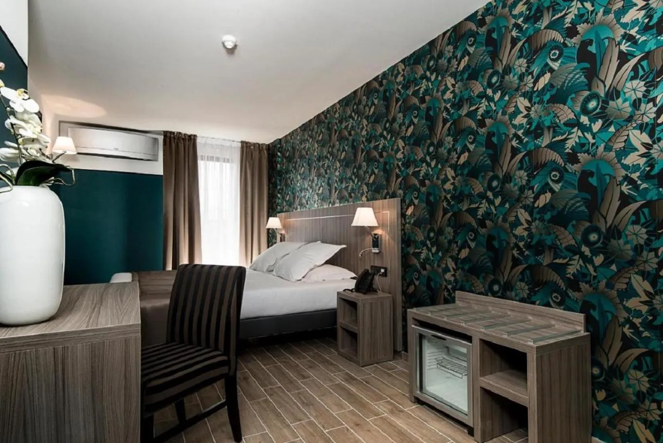 Bedroom, Bed in Unique Hôtel Résidence & Spa