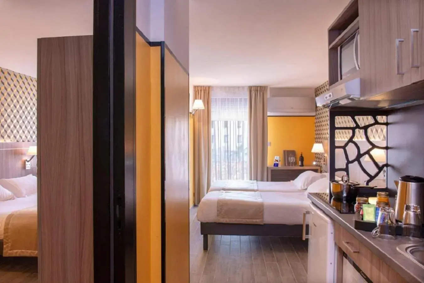 Bedroom, Bed in Unique Hôtel Résidence & Spa Bedroom, Bed in Unique Hôtel Résidence & Spa