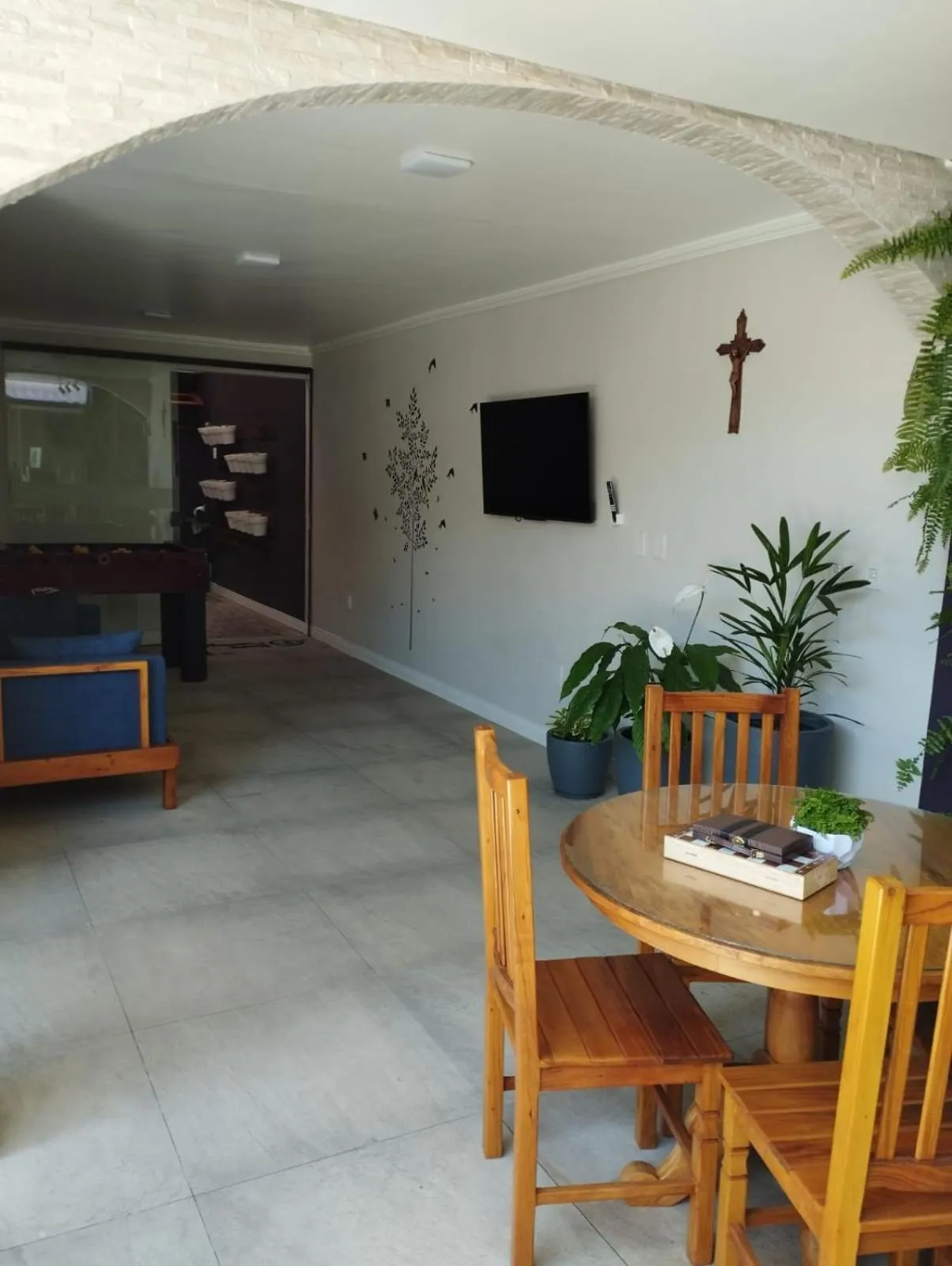 Communal lounge/ TV room in Hope Pousada