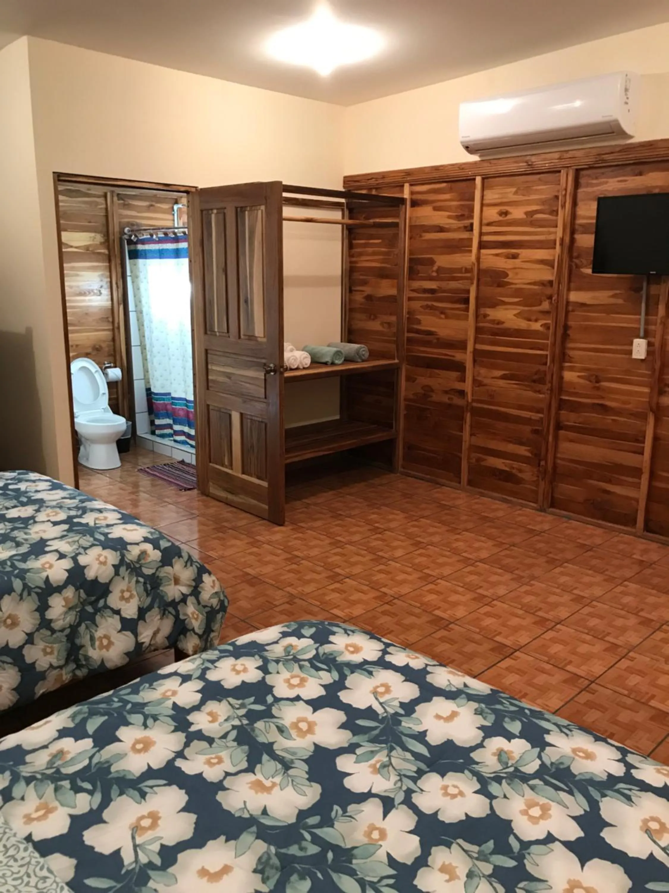 View (from property/room), Bed in Hotel Cabañas La Teca