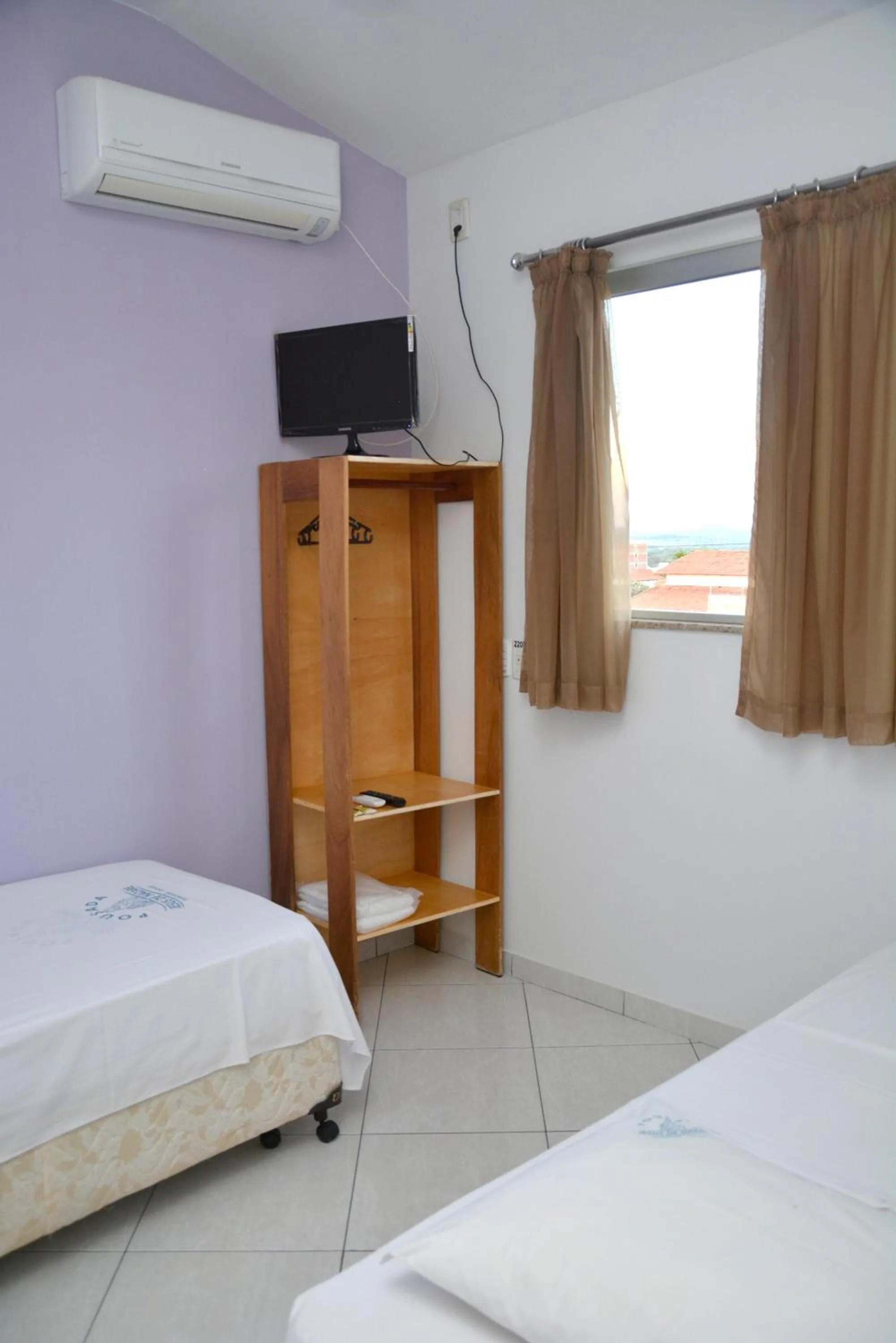 Bed in Pousada Jesus De Nazare