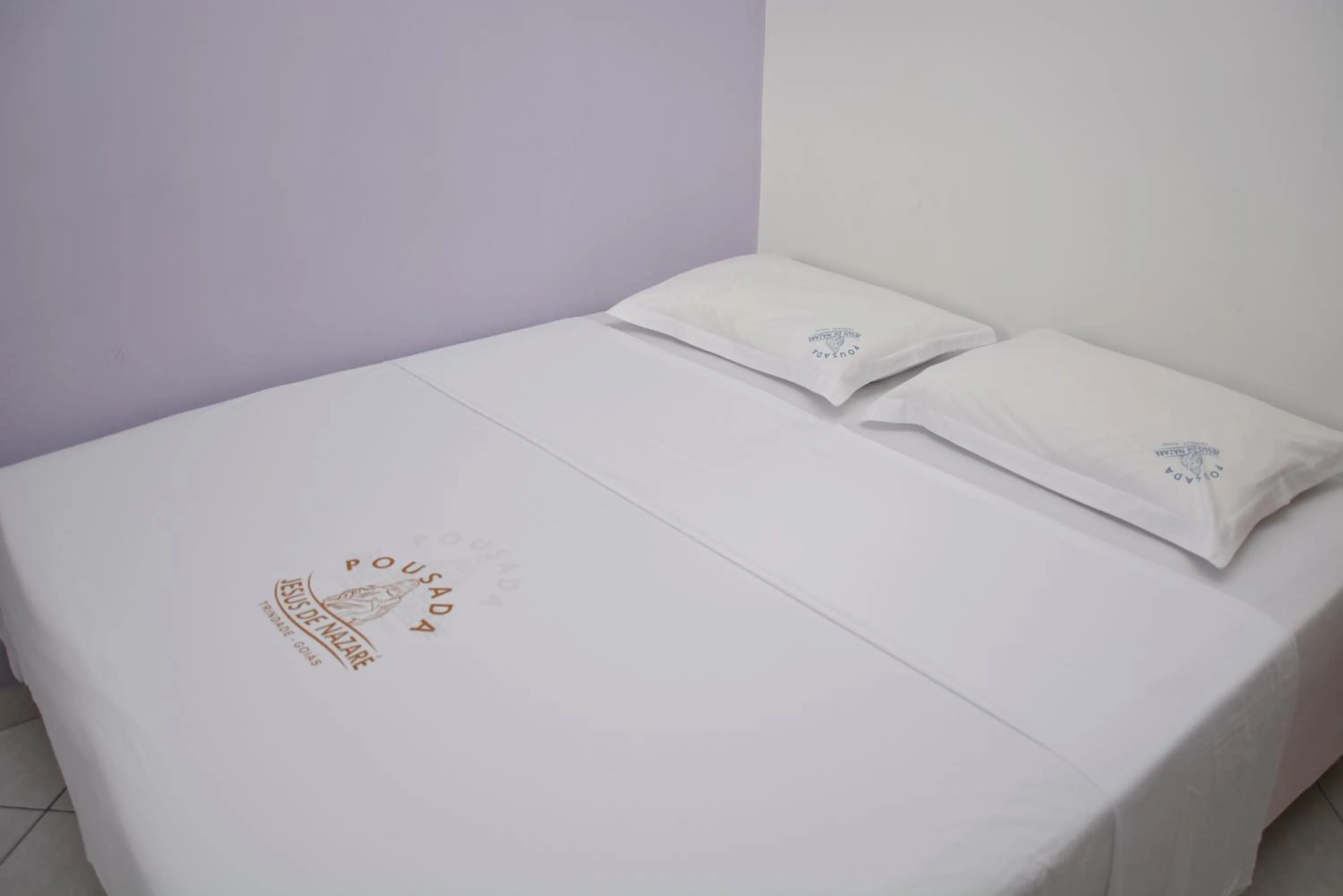 Bed in Pousada Jesus De Nazare