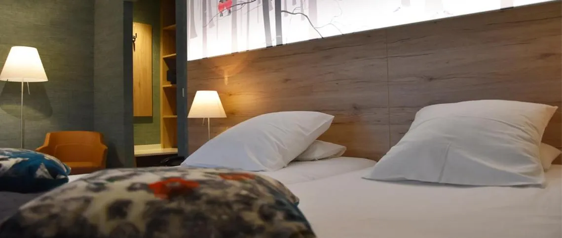 Bed in Hostellerie du Peiffeschof, The Originals Relais