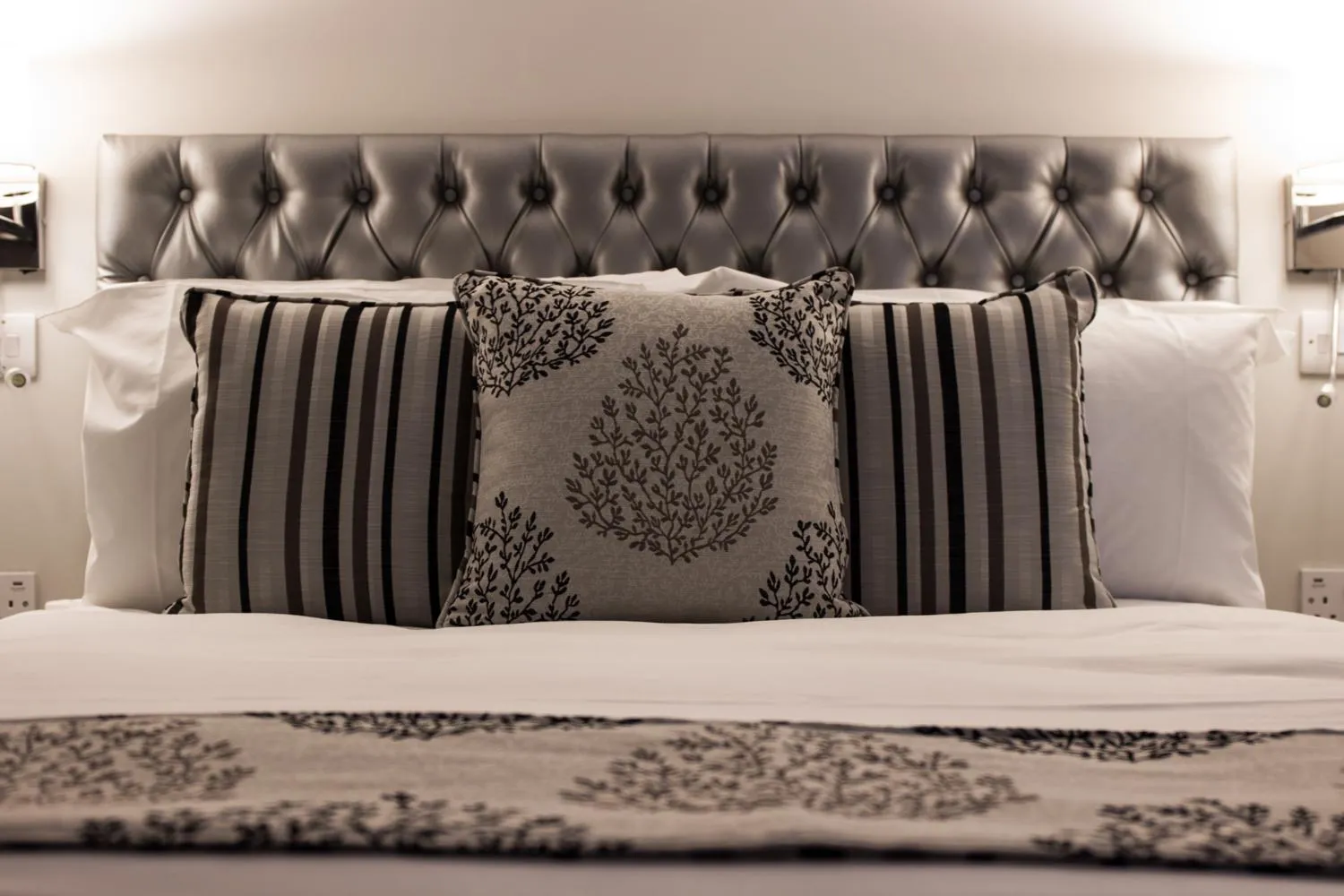 Bed in The Maple Manor Hotel