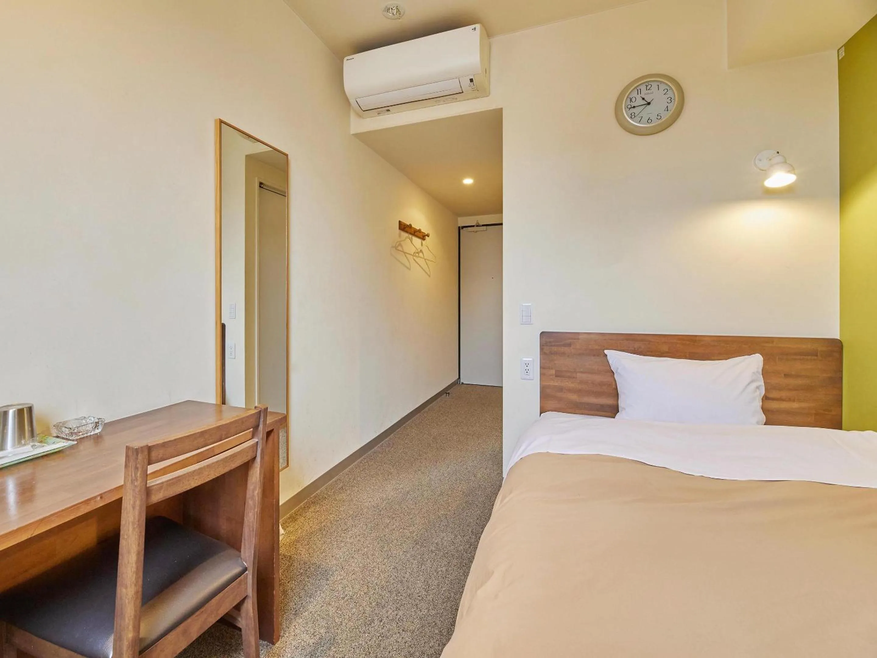 Bed in Kumagaya Royal Hotel Suzuki