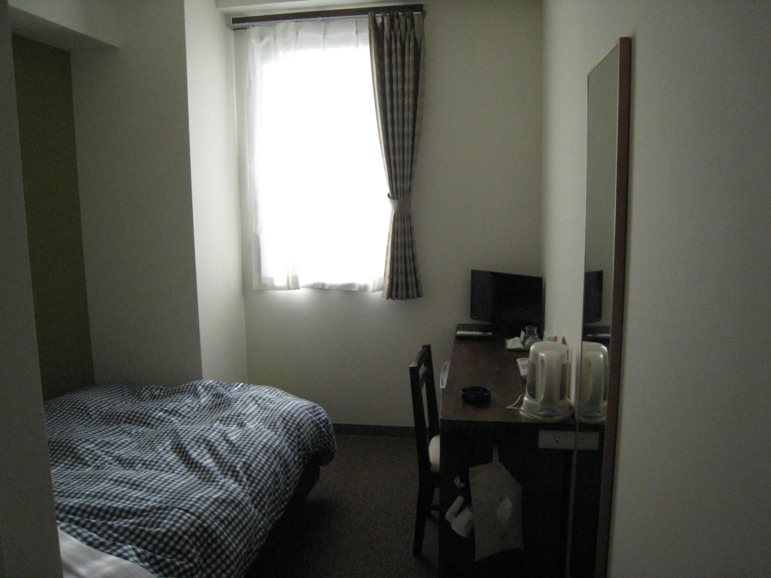 Bed in Kumagaya Royal Hotel Suzuki