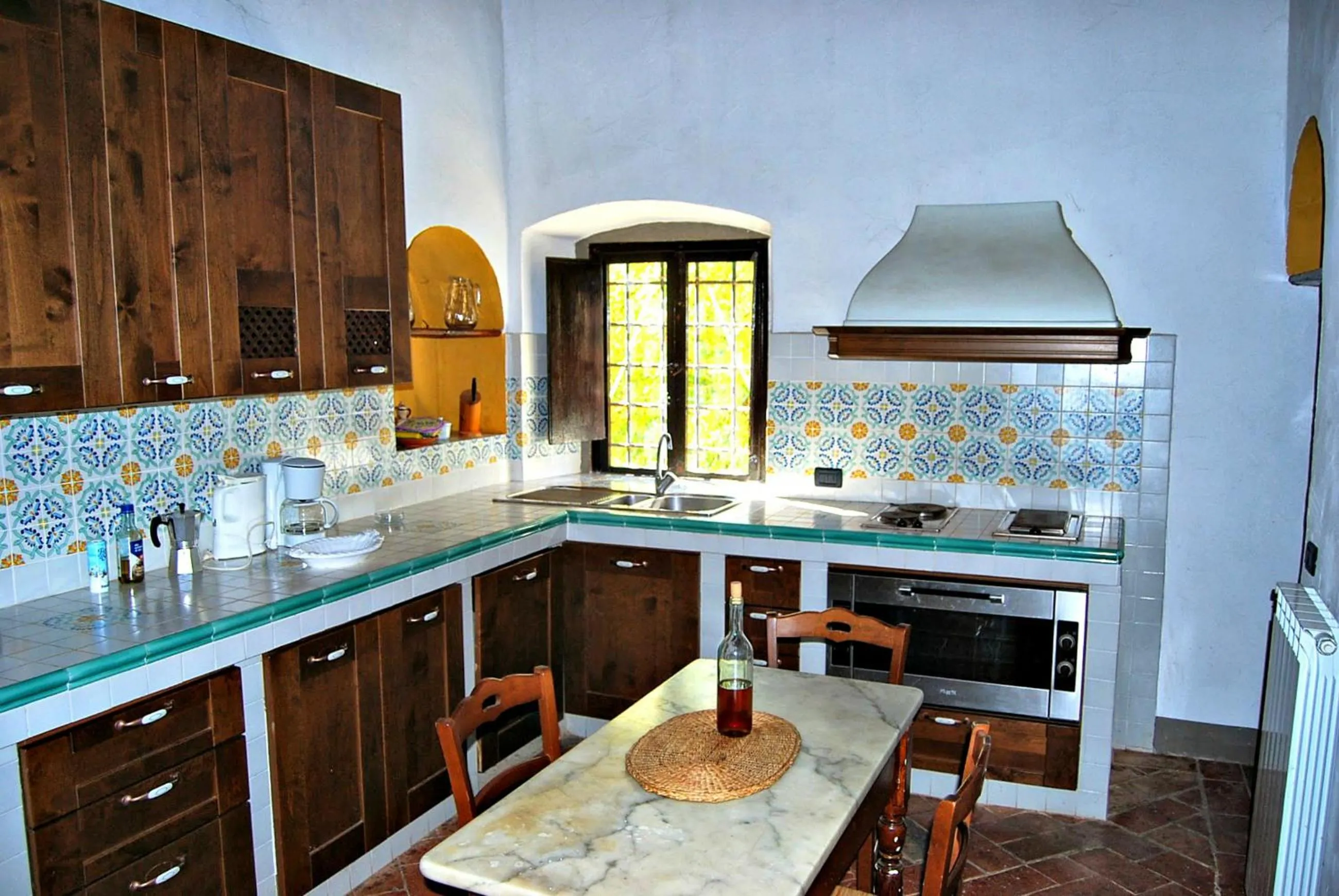 Kitchen or kitchenette in Villa Marisel