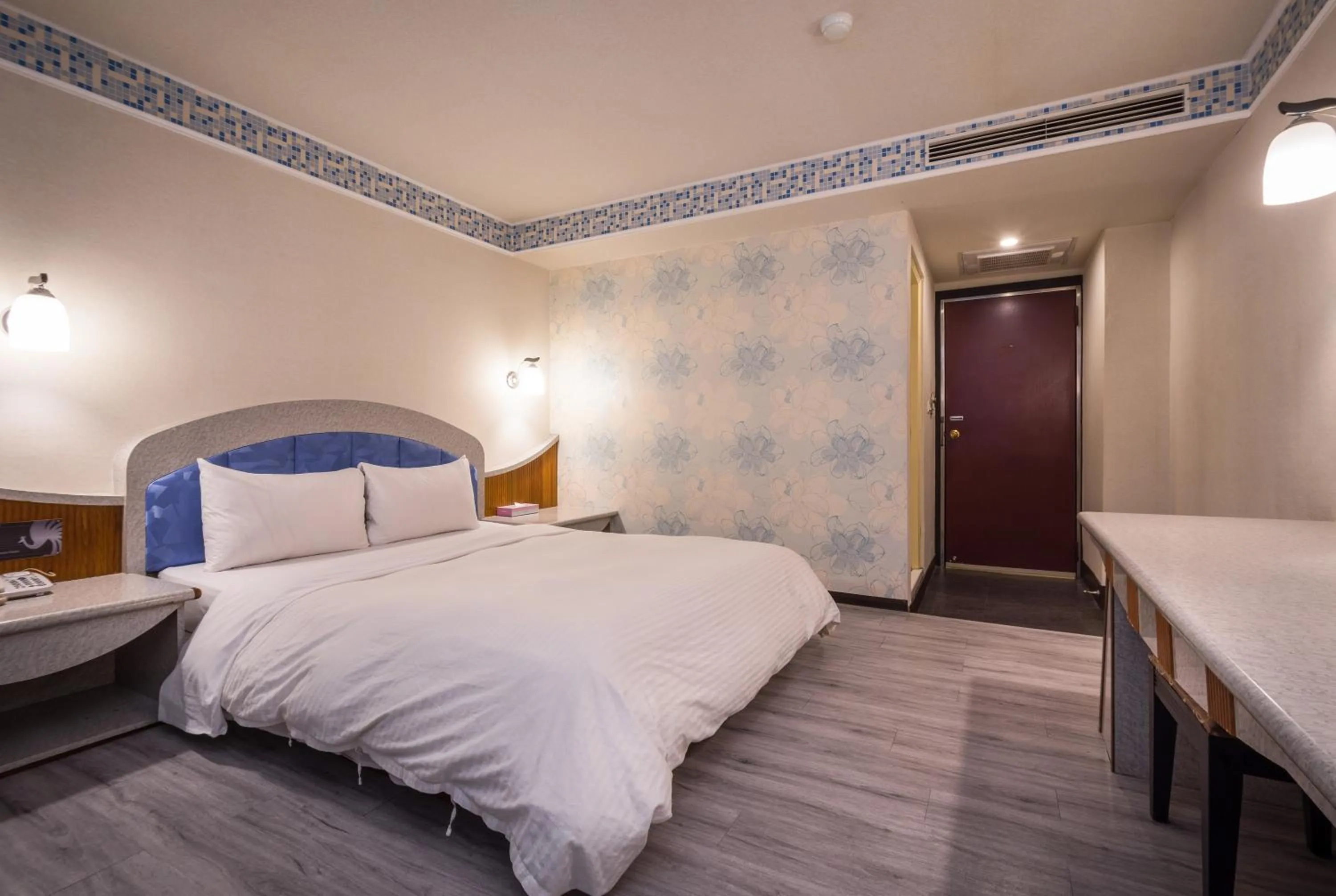 Decorative detail, Bed in Golden Phoenix Hotel