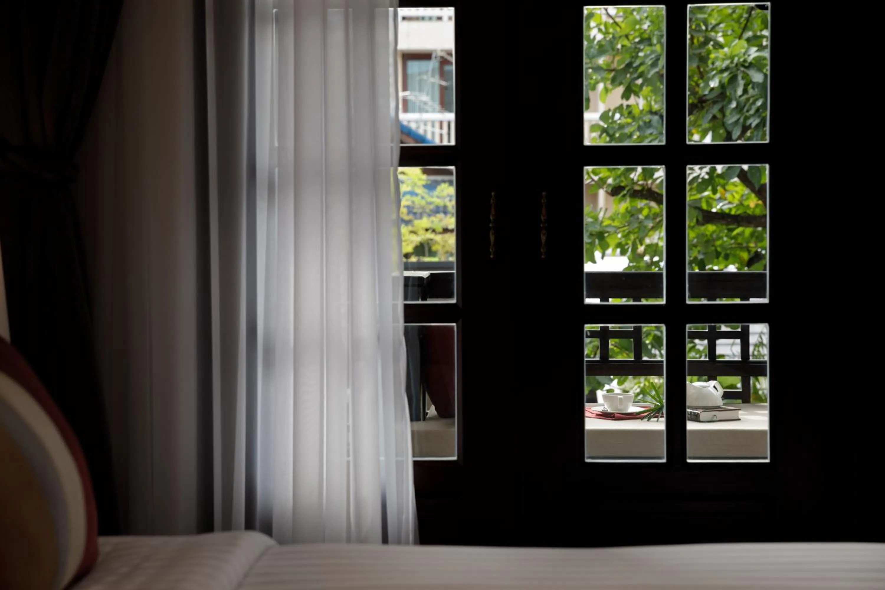 Decorative detail, Bed in Thai Akara - Lanna Boutique Hotel