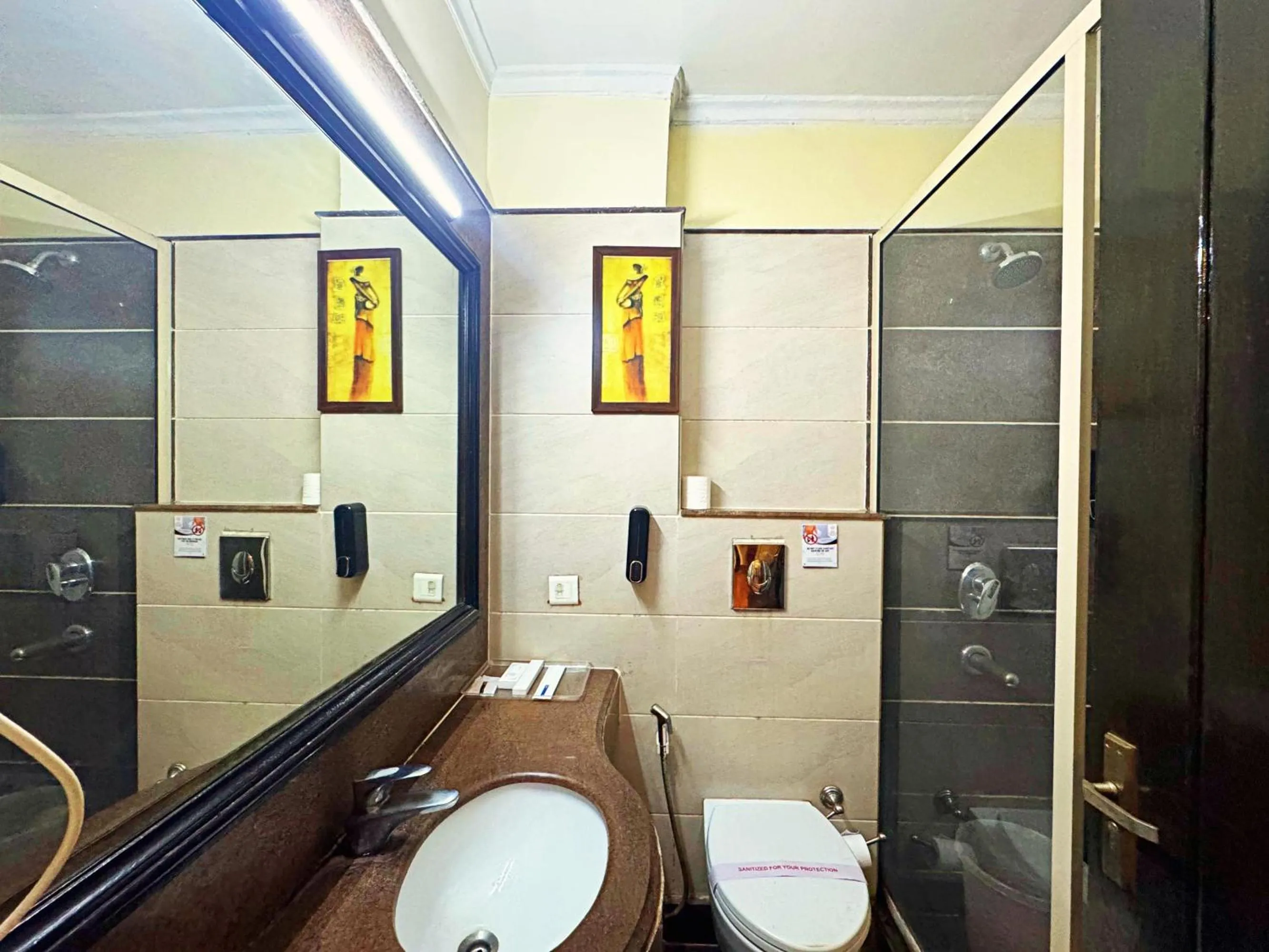 Toilet in The Oakland Plaza by Orion Hotels