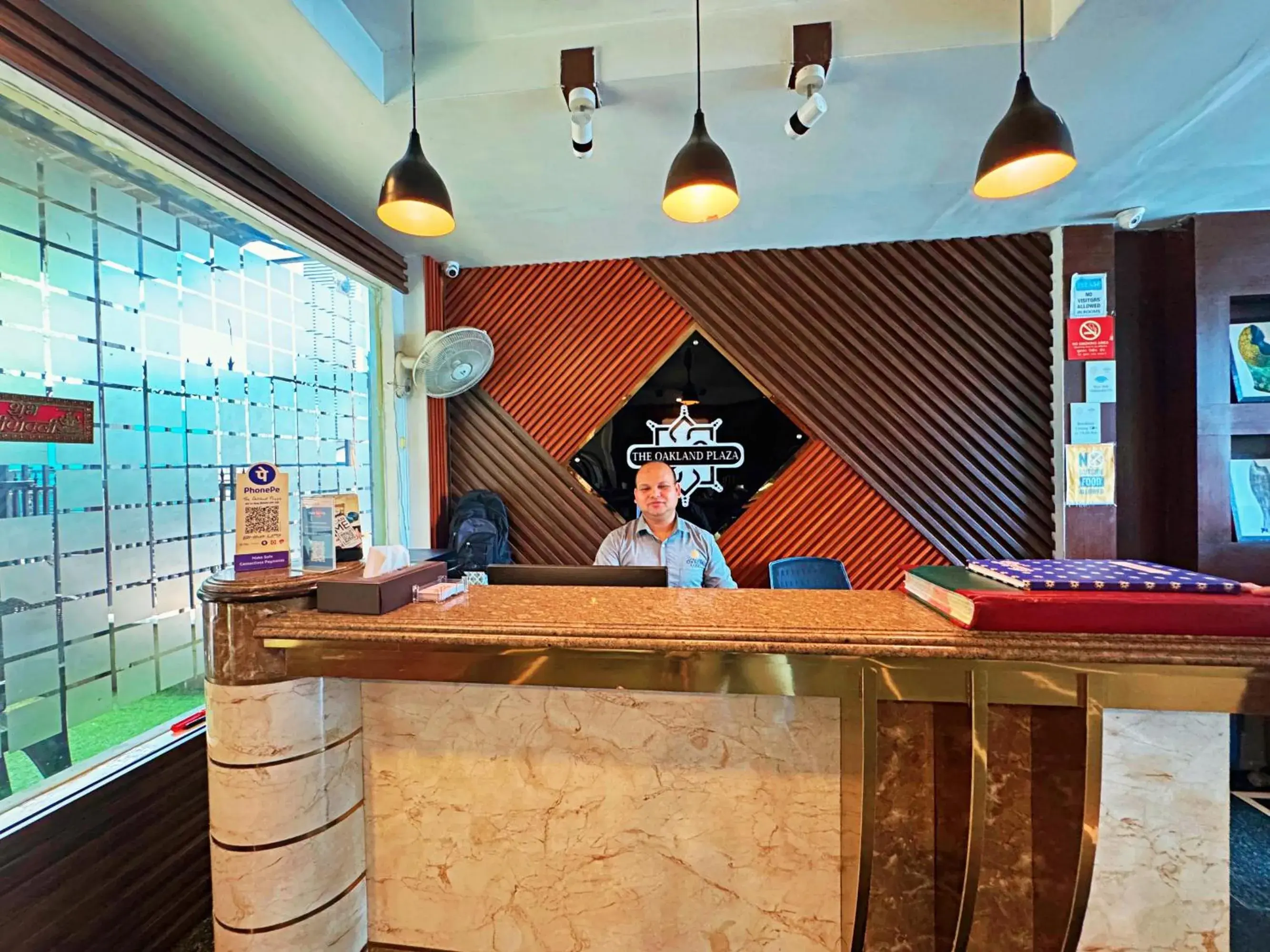 Lobby or reception in The Oakland plaza - Nehru Place by Orion Hotels Lobby or reception in The Oakland plaza - Nehru Place by Orion Hotels