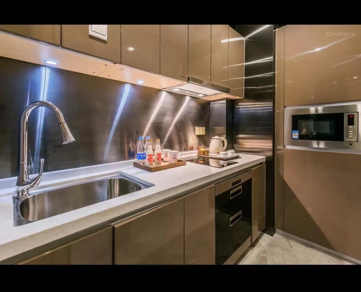 Kitchen or kitchenette in Green Lemon Tree International Apartment - Beijing Road Jiedeng Metropolis Branch