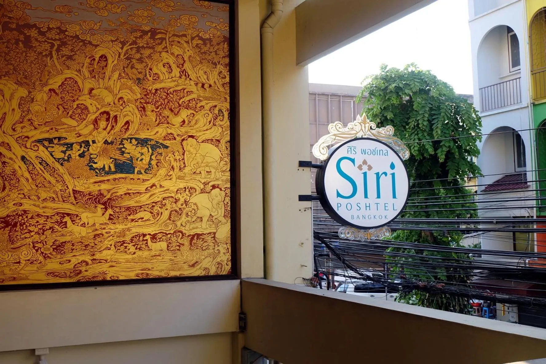 Property logo or sign in Siri Poshtel Bangkok