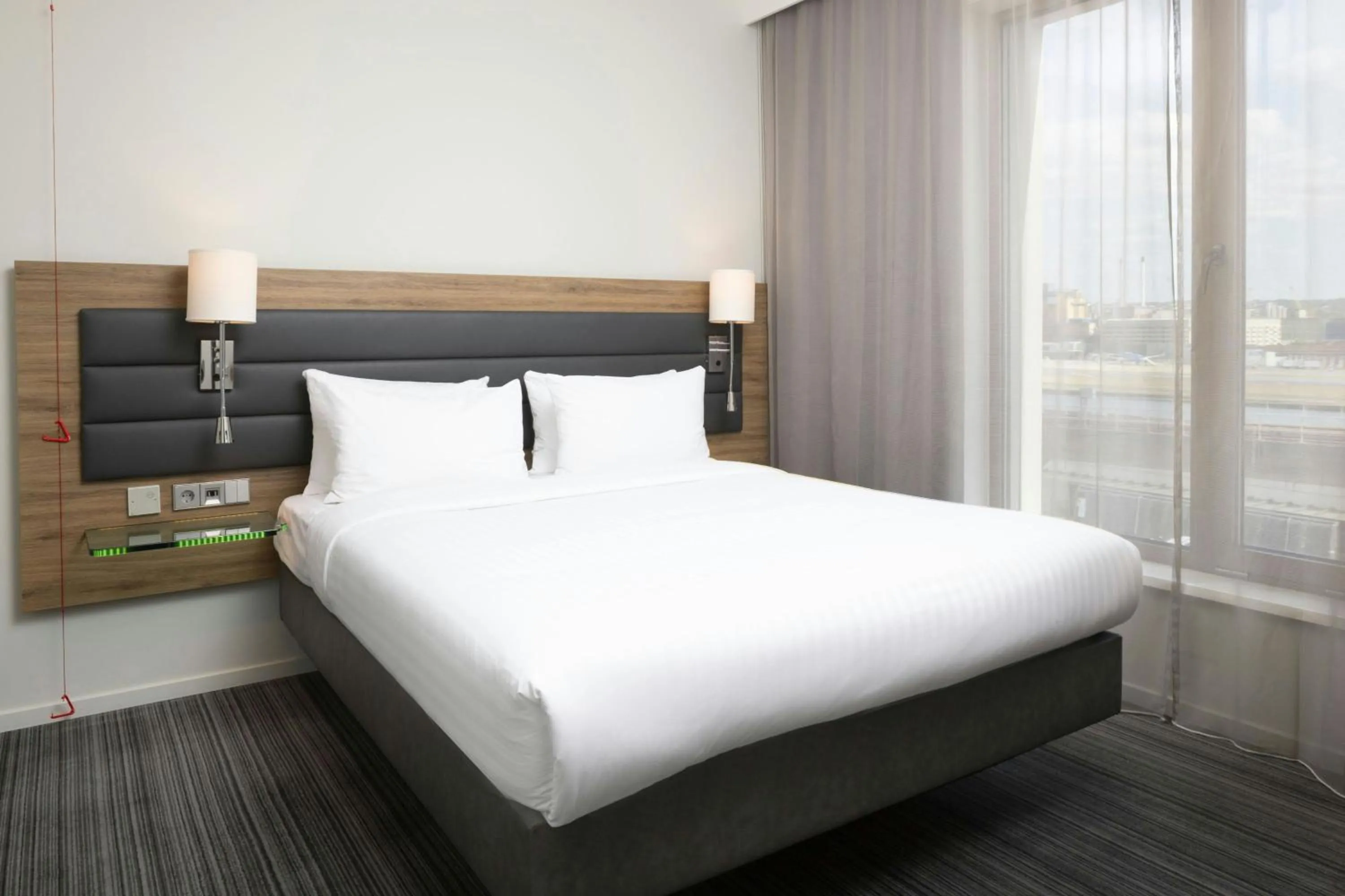 Photo of the whole room, Bed in Moxy London Excel