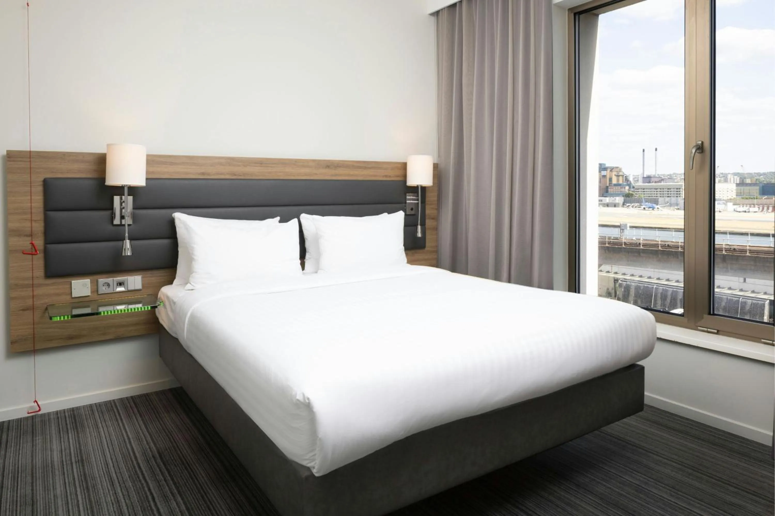 Photo of the whole room, Bed in Moxy London Excel