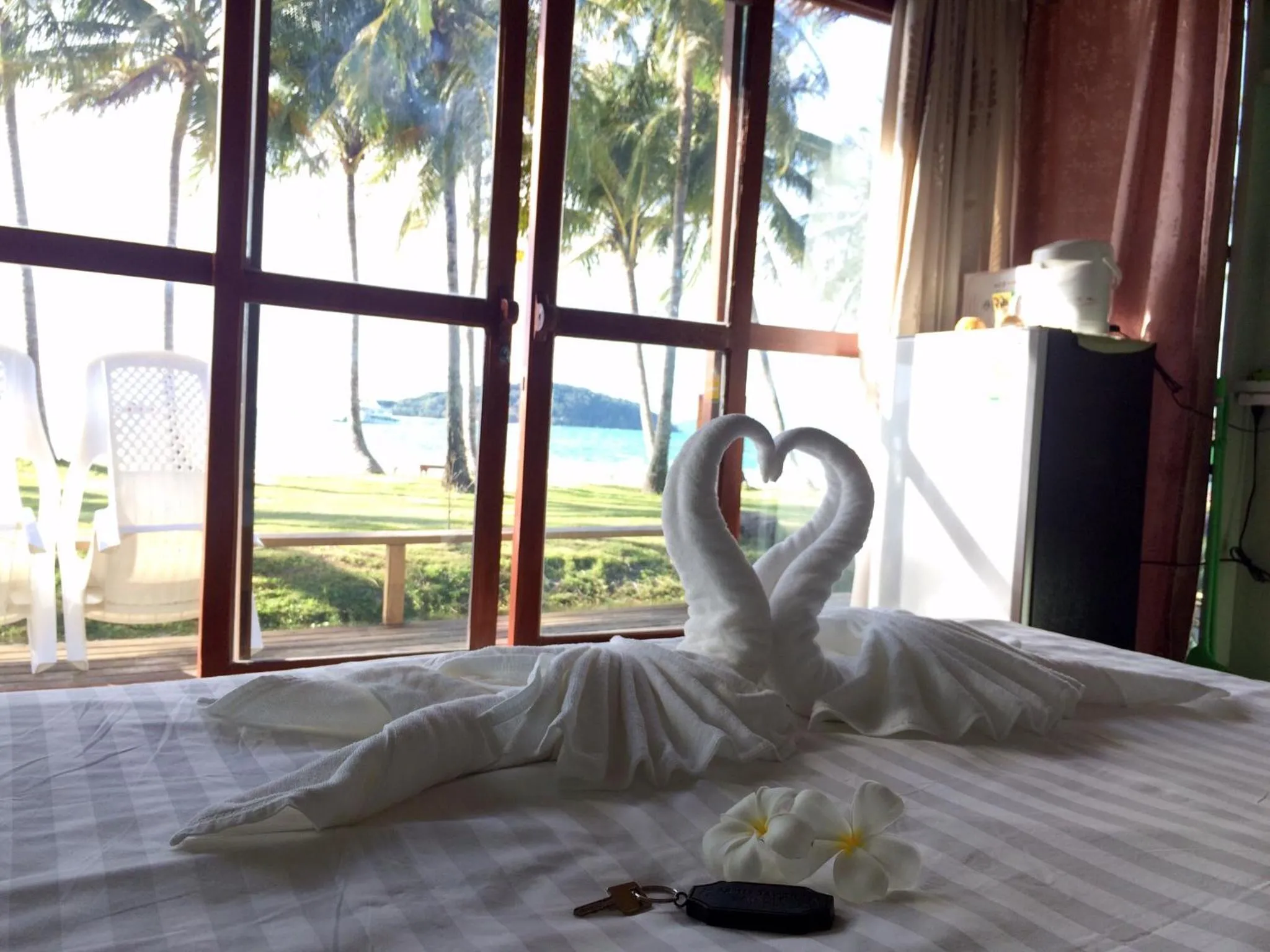 Bed in Prompakdee Kohmak Resort