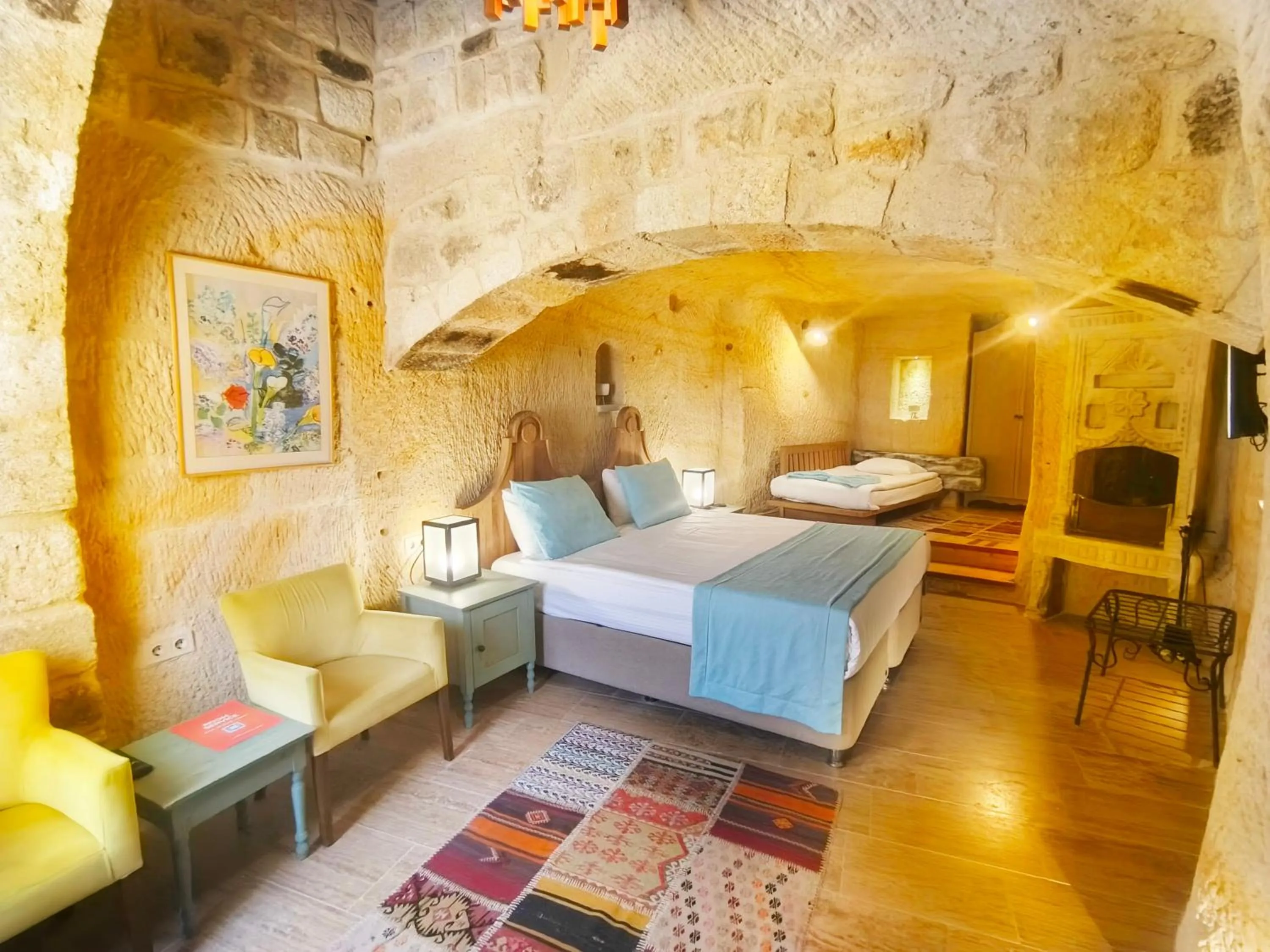 Bed in Acropolis Cave Suite