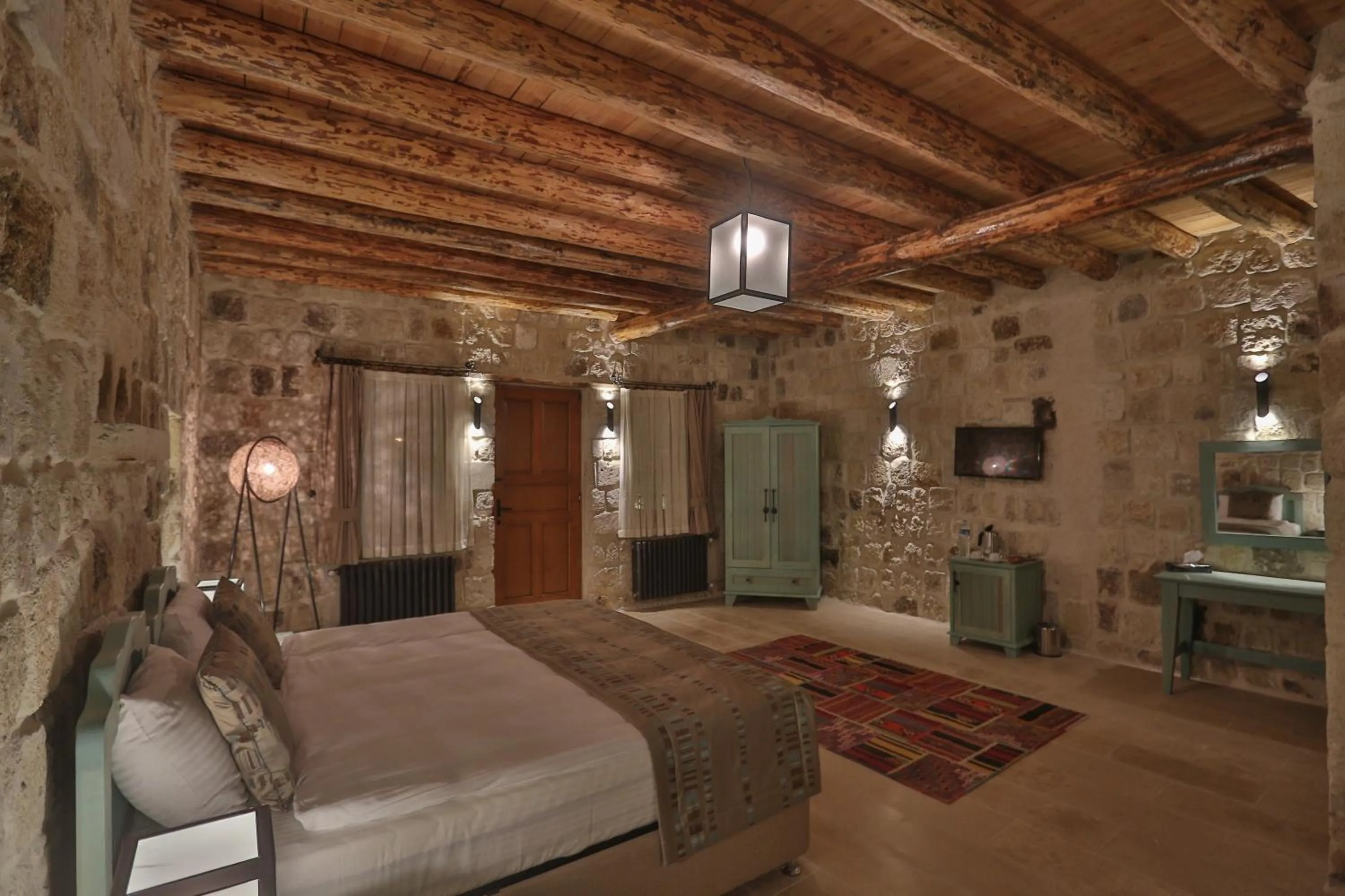 Photo of the whole room, Bed in Acropolis Cave Suite