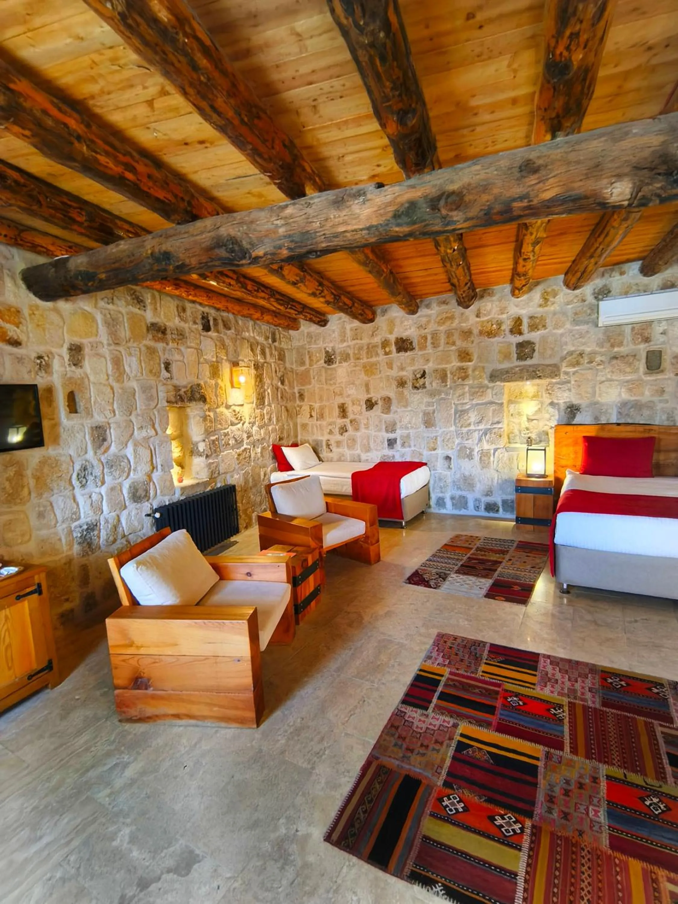 Bed in Acropolis Cave Suite