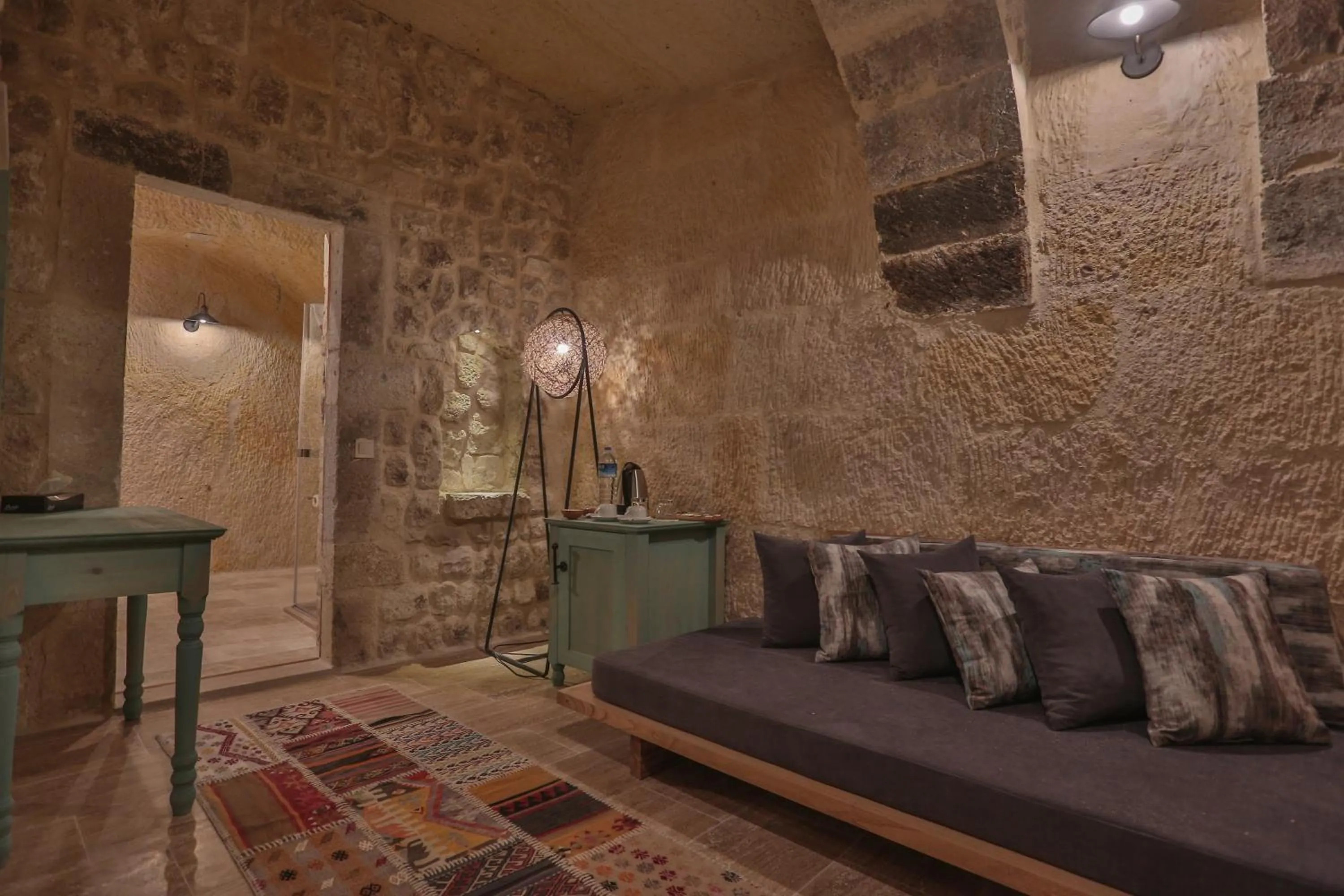 Bedroom in Acropolis Cave Suite
