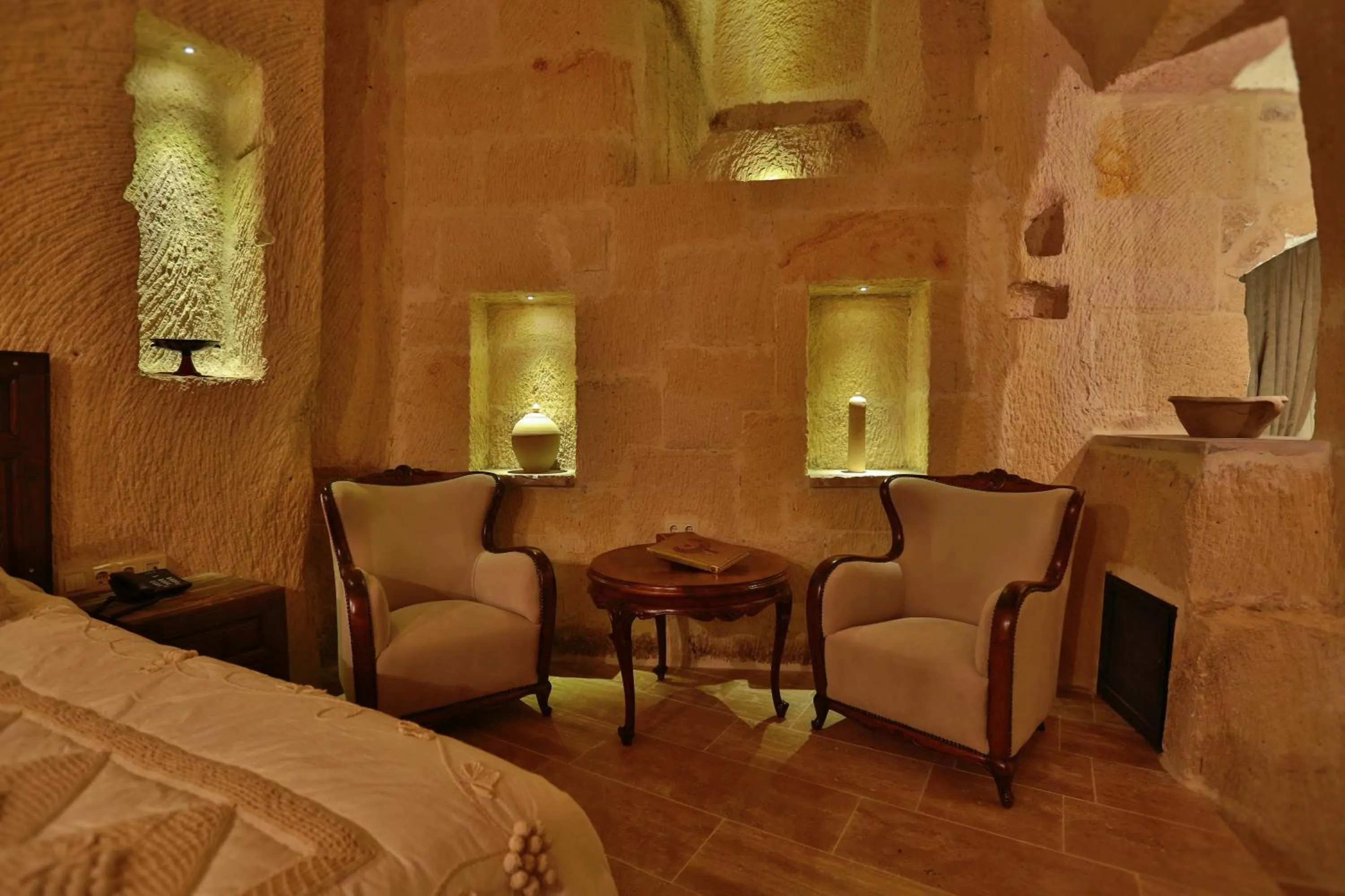 Bed in Acropolis Cave Suite