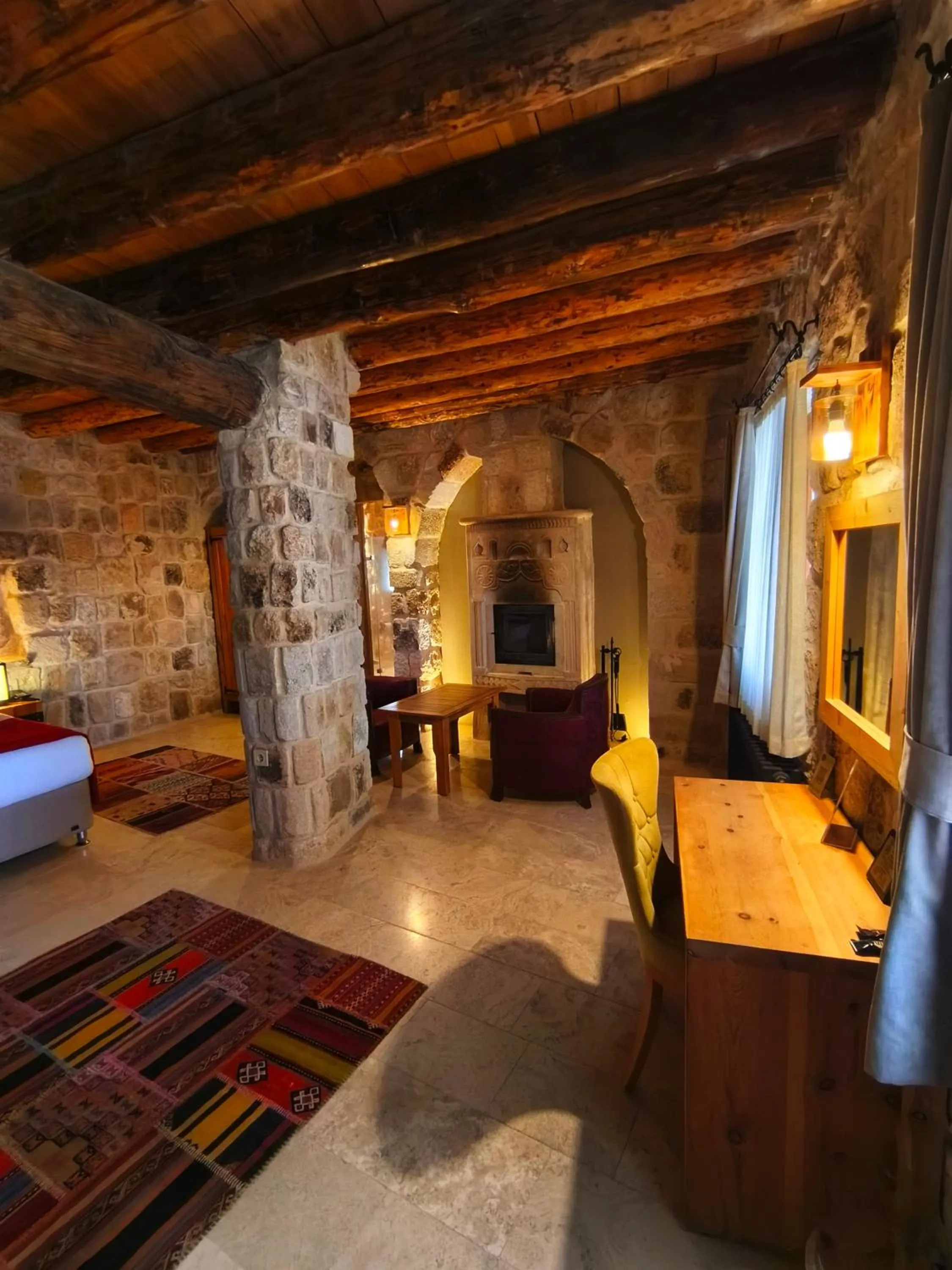 Bed in Acropolis Cave Suite