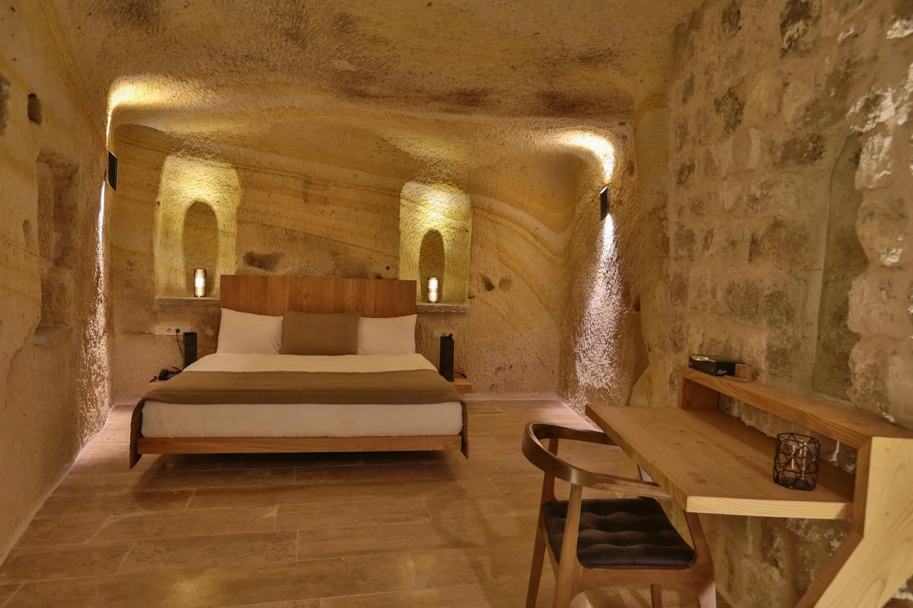 Hot Tub, Bed in Acropolis Cave Suite