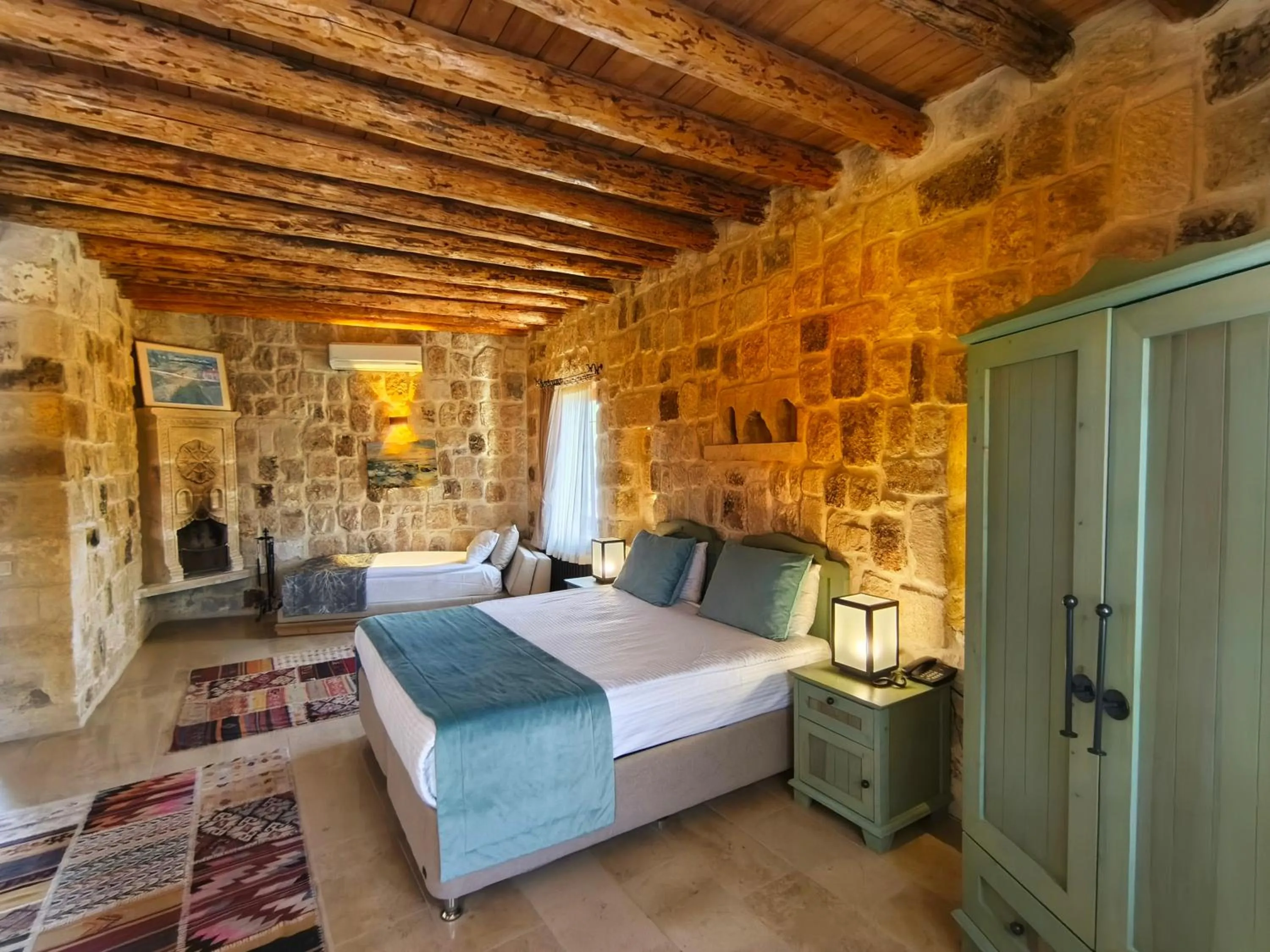 Bedroom, Bed in Acropolis Cave Suite