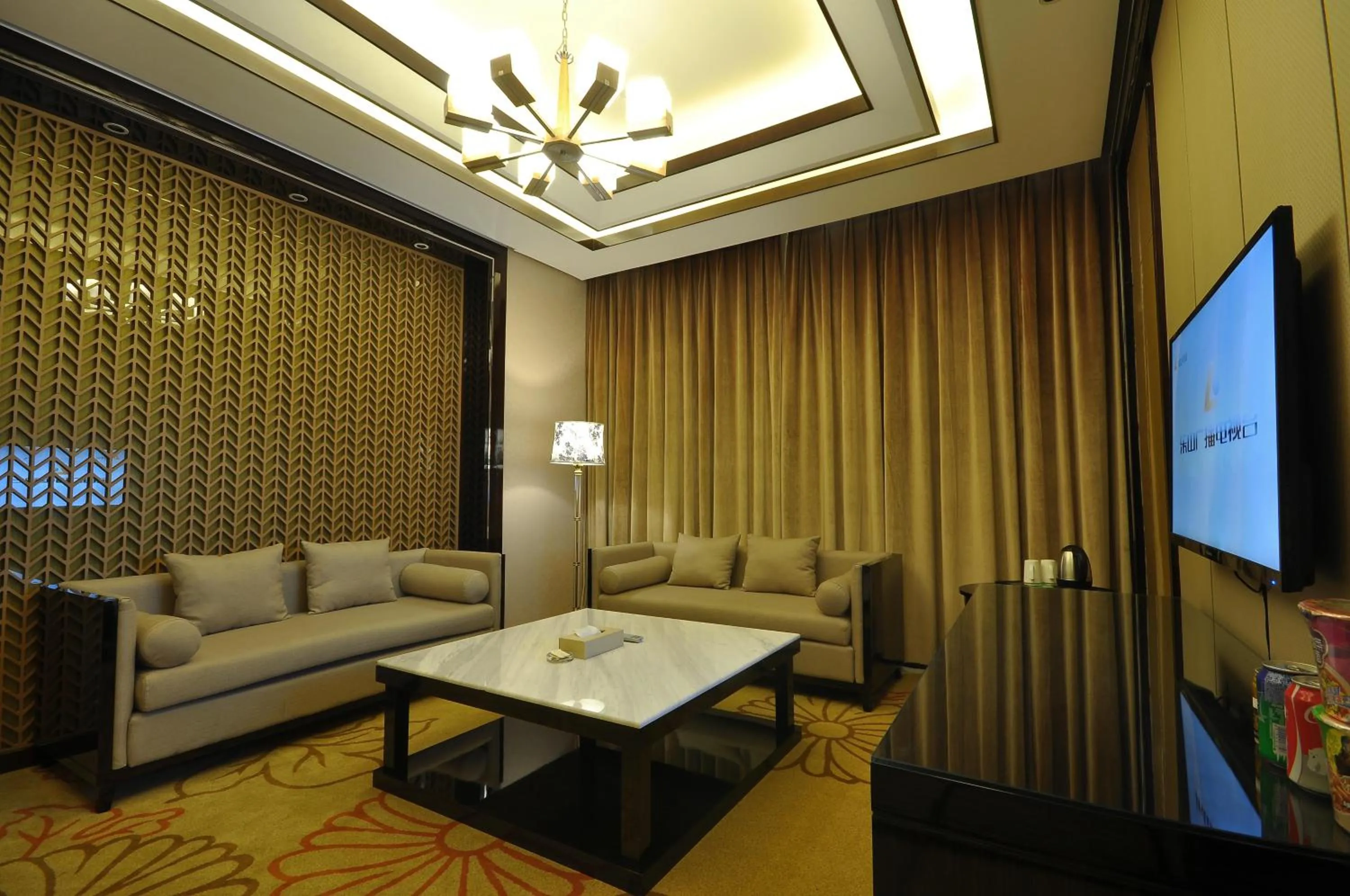 Living room in Jin-Tai Holiday Hotel