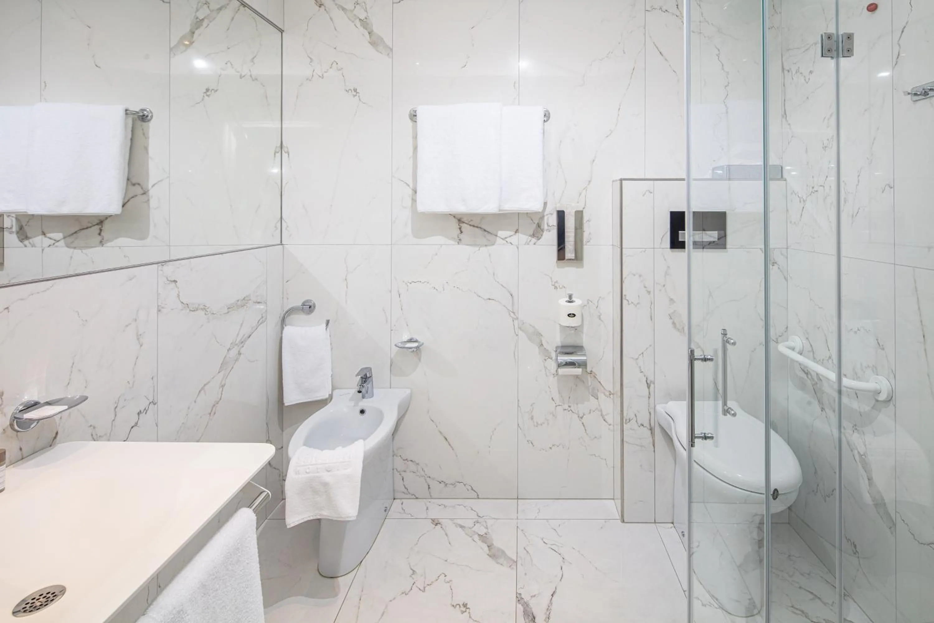 Bathroom in Monaco Suites Hotel