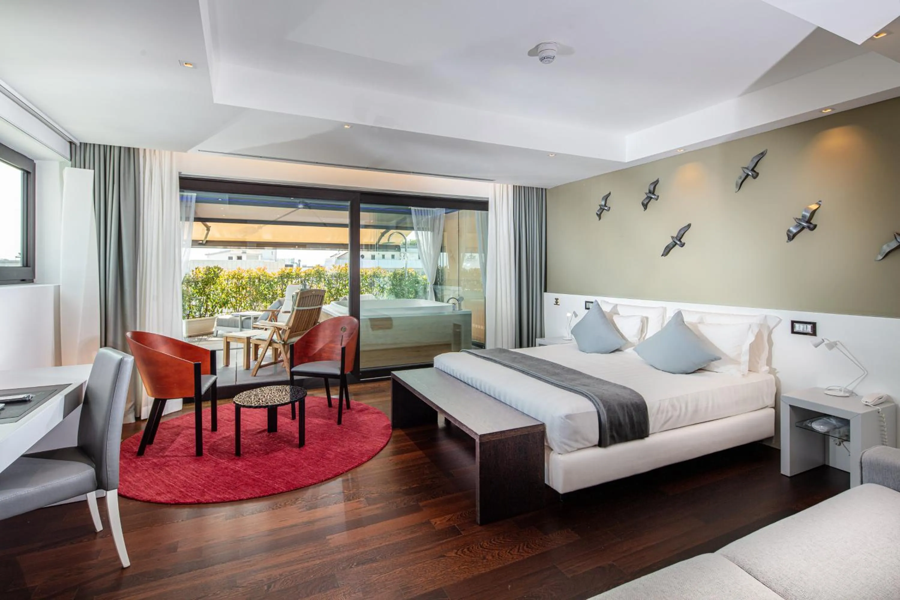 Bedroom in Monaco Suites Hotel