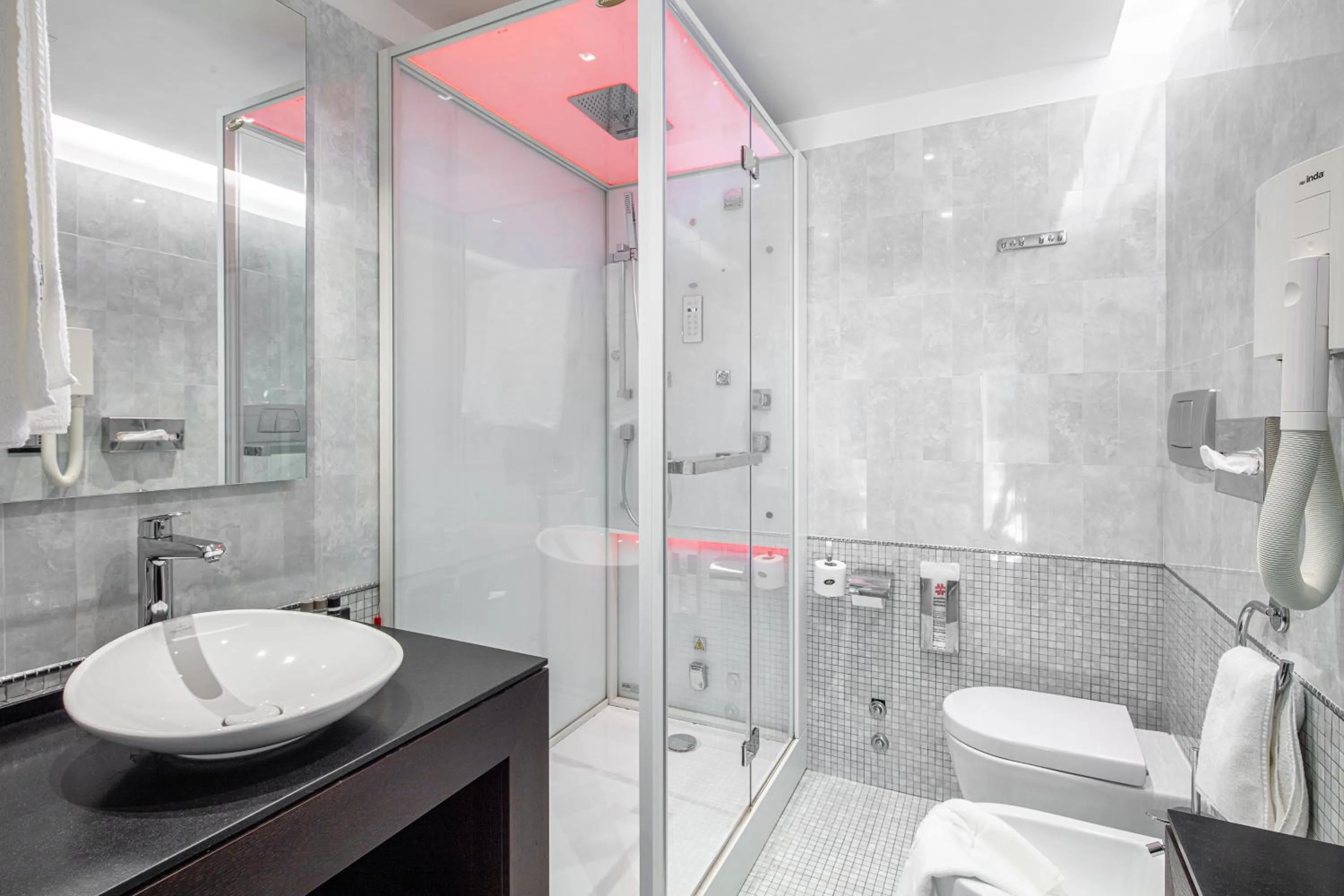 Bathroom in Monaco Suites Hotel