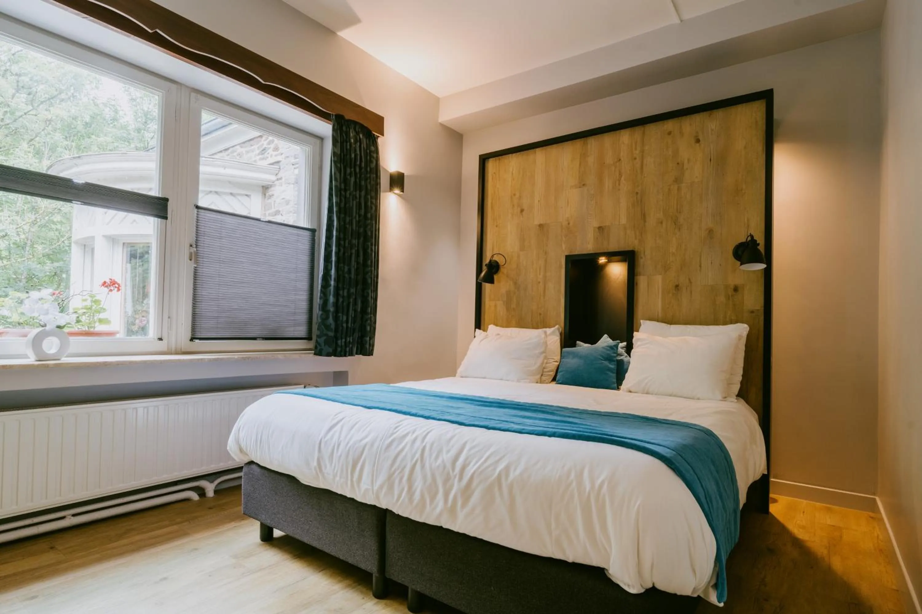 Bed in Hotel L'eau Vive