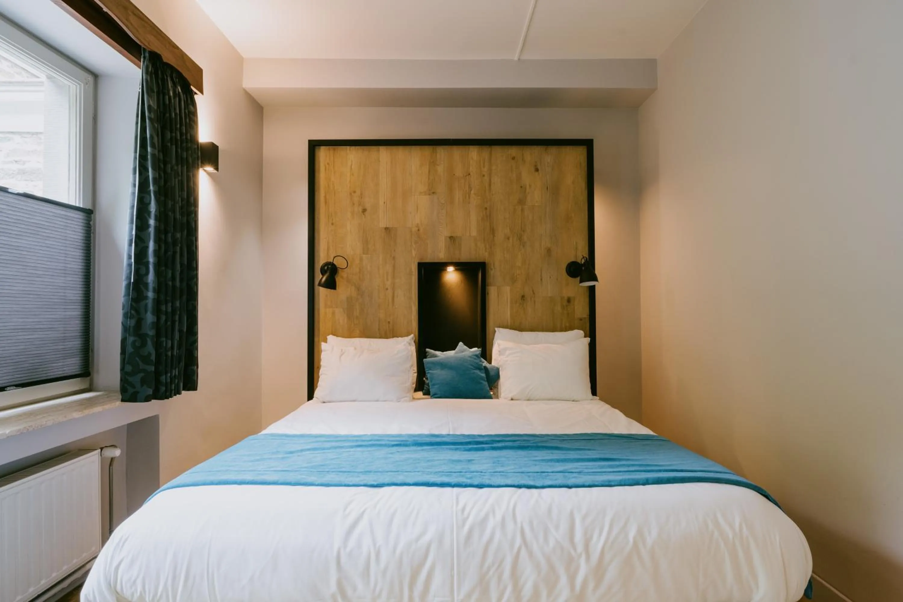 Bed in Hotel L'eau Vive