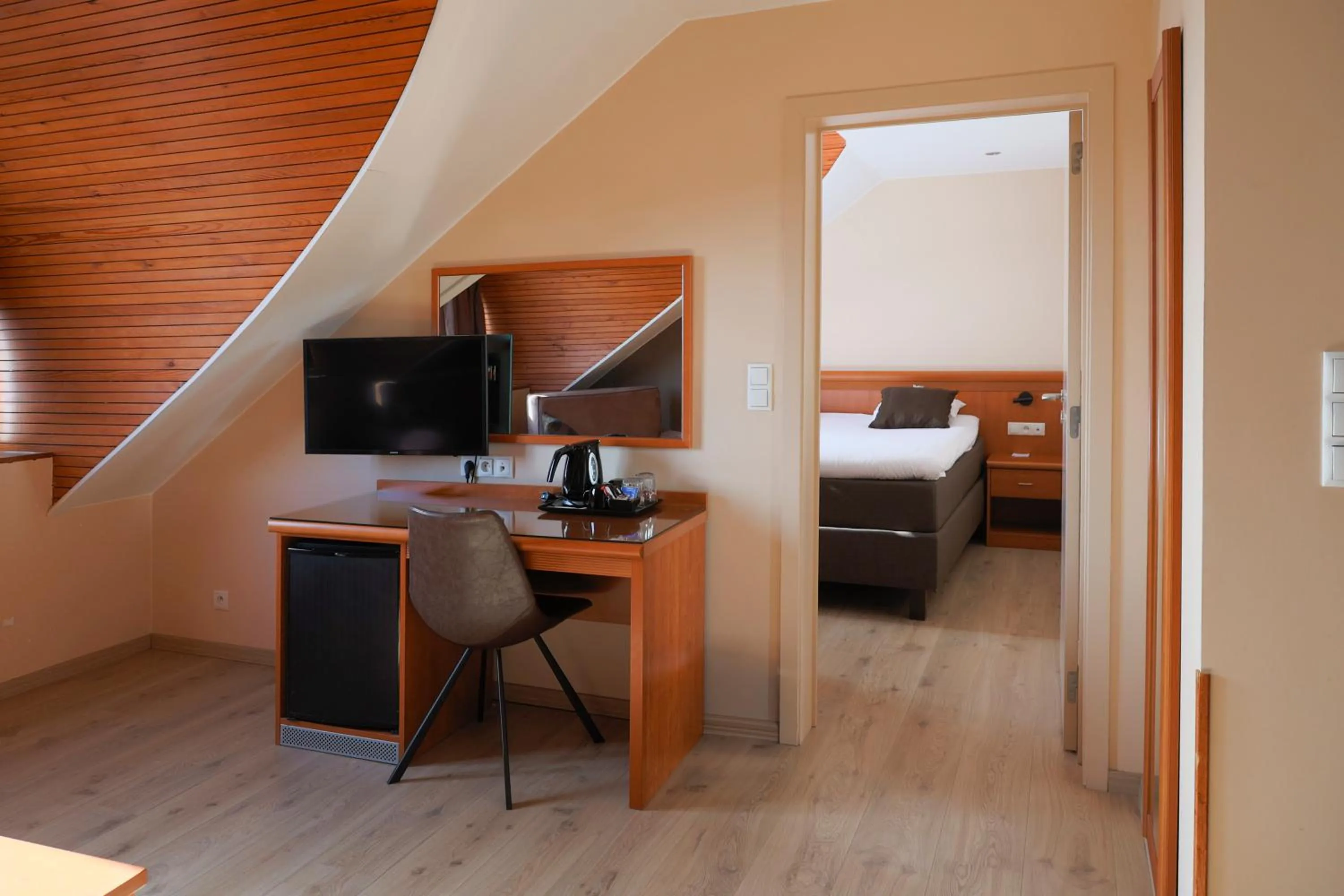 Seating area, Bed in Hotel Melba