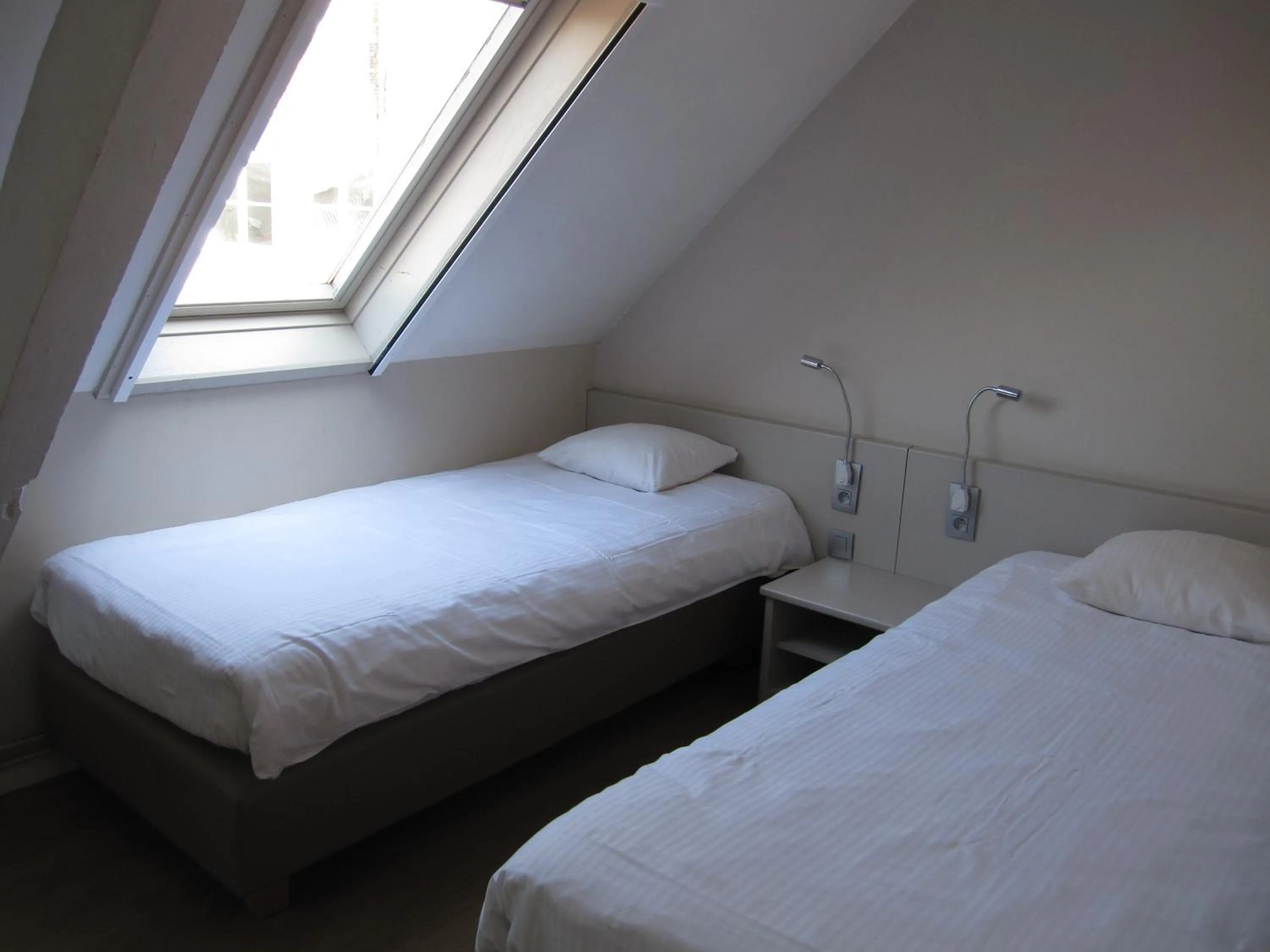 Bed in Bonobo Apartments