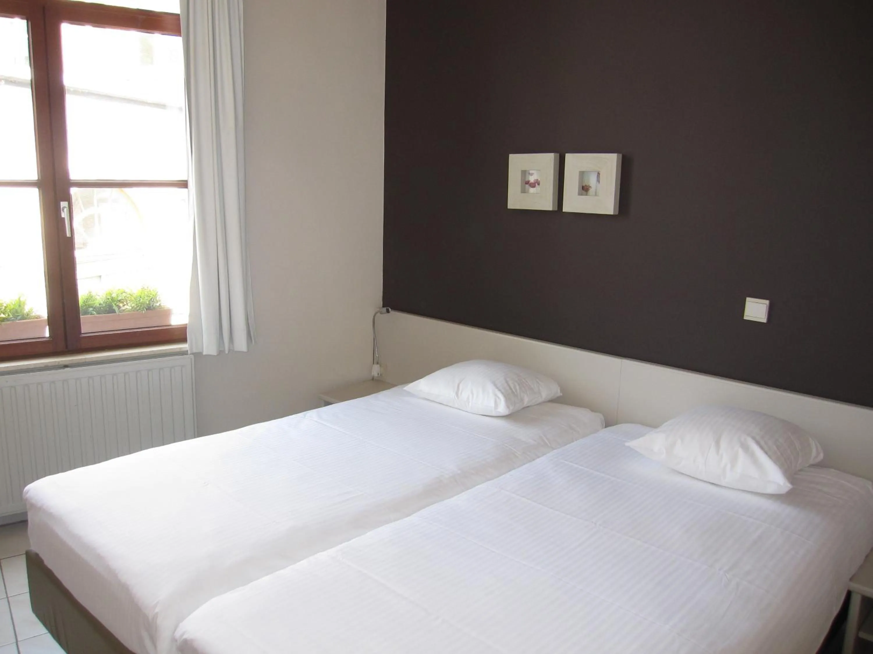 Bed in Bonobo Apartments