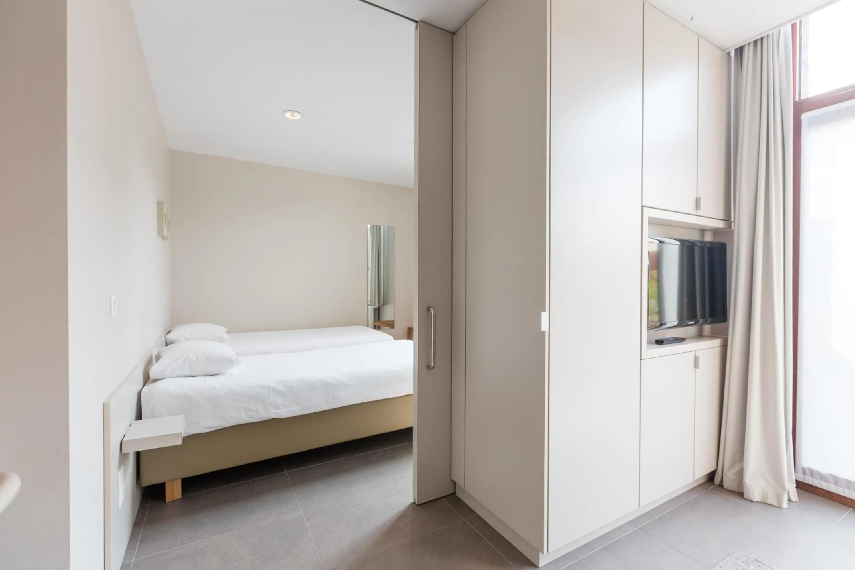 Day, Bed in Bonobo Apartments