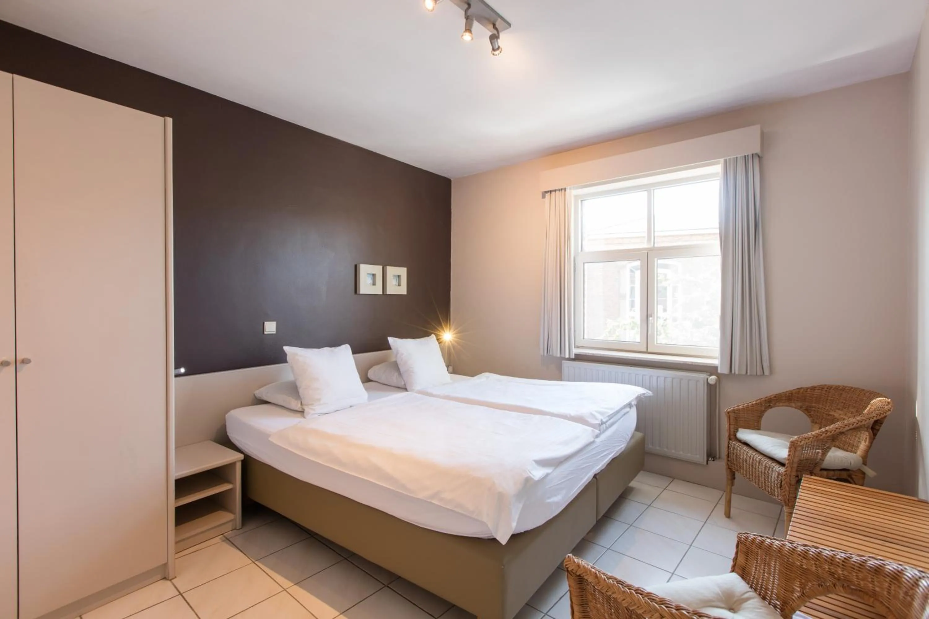 Day, Bed in Bonobo Apartments