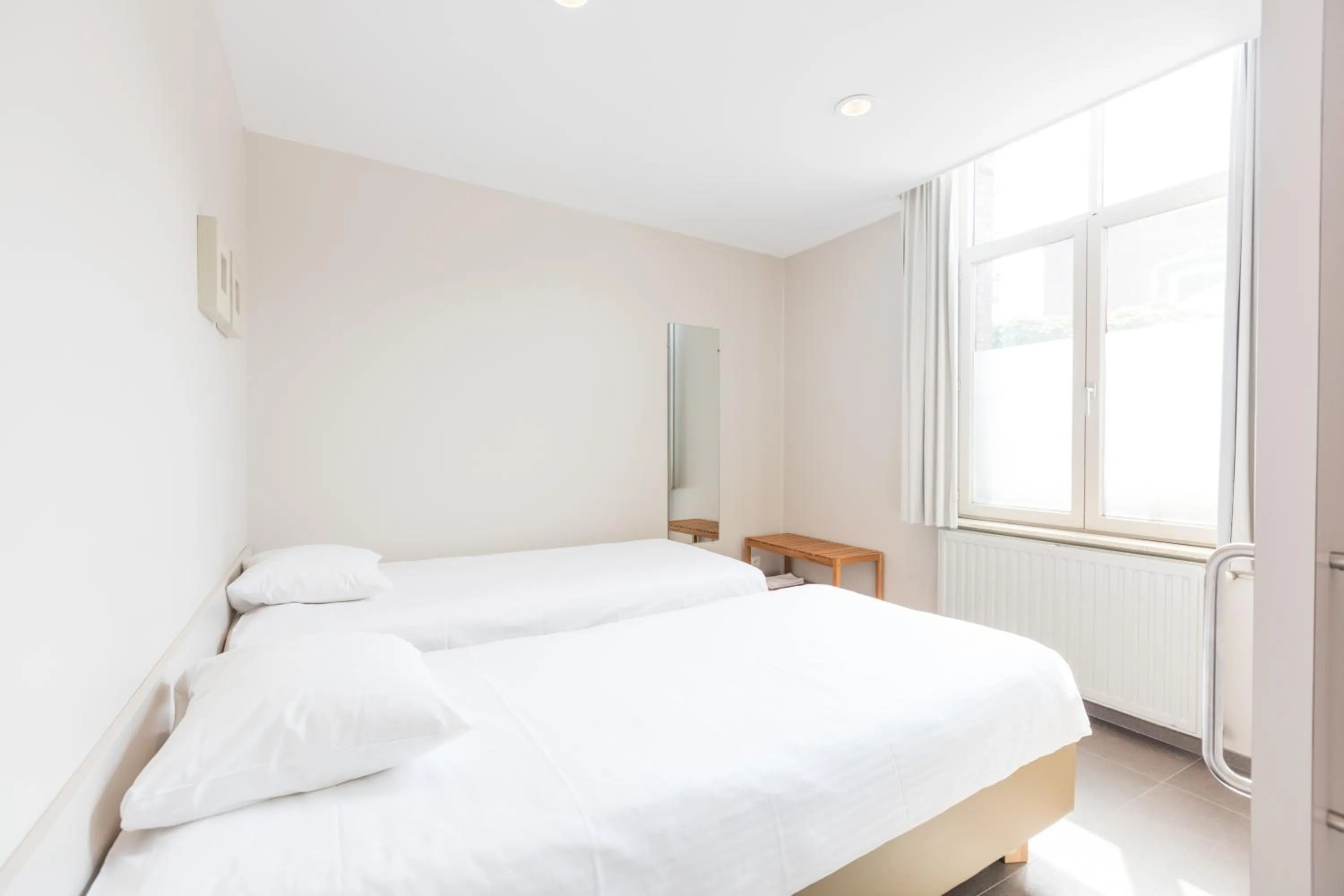 Day, Bed in Bonobo Apartments
