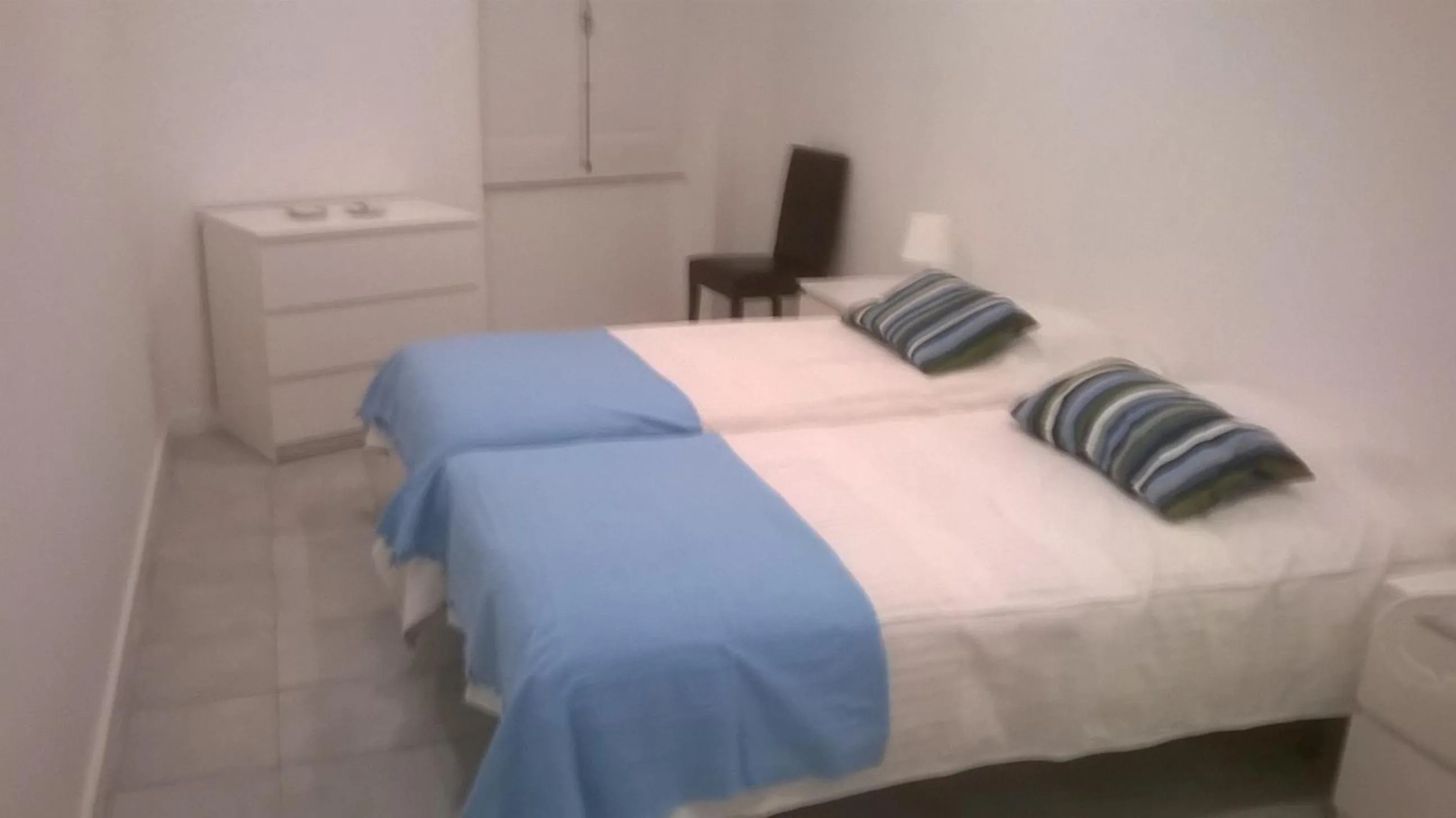 Bed in Down Bonjardim Apartments