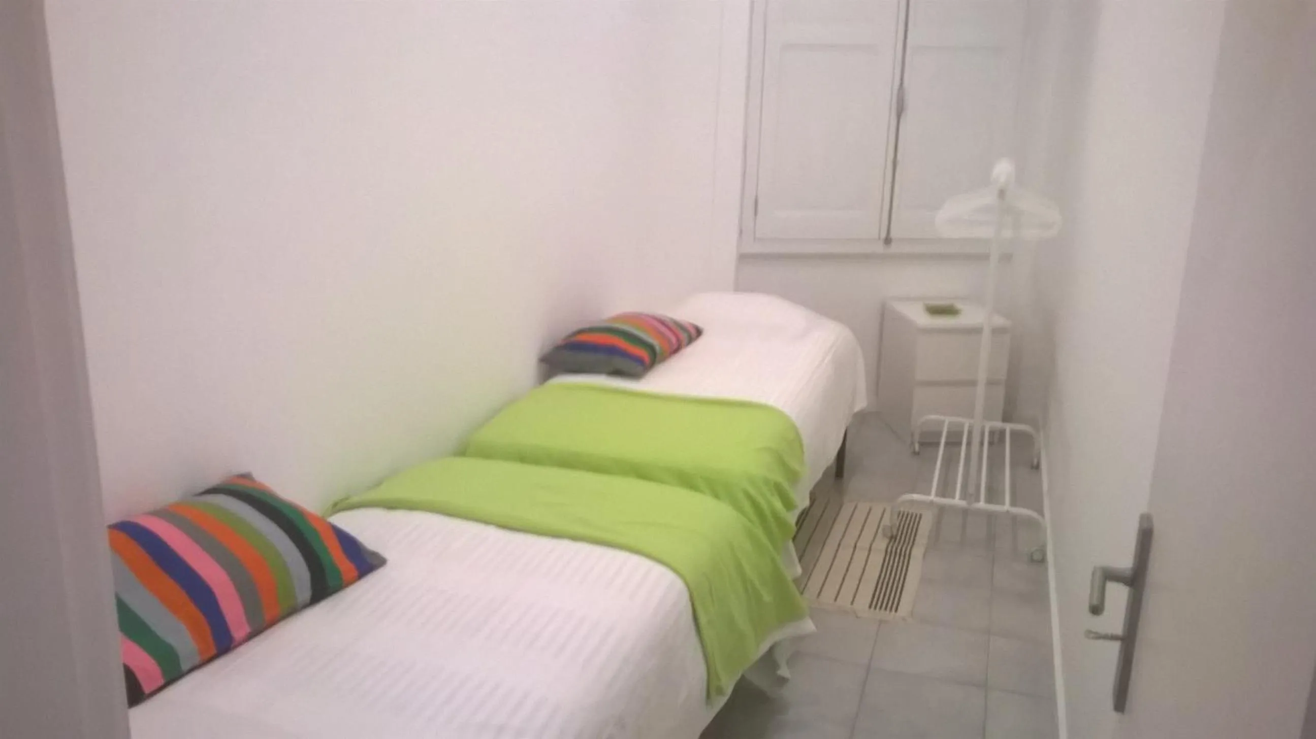Bed in Down Bonjardim Apartments