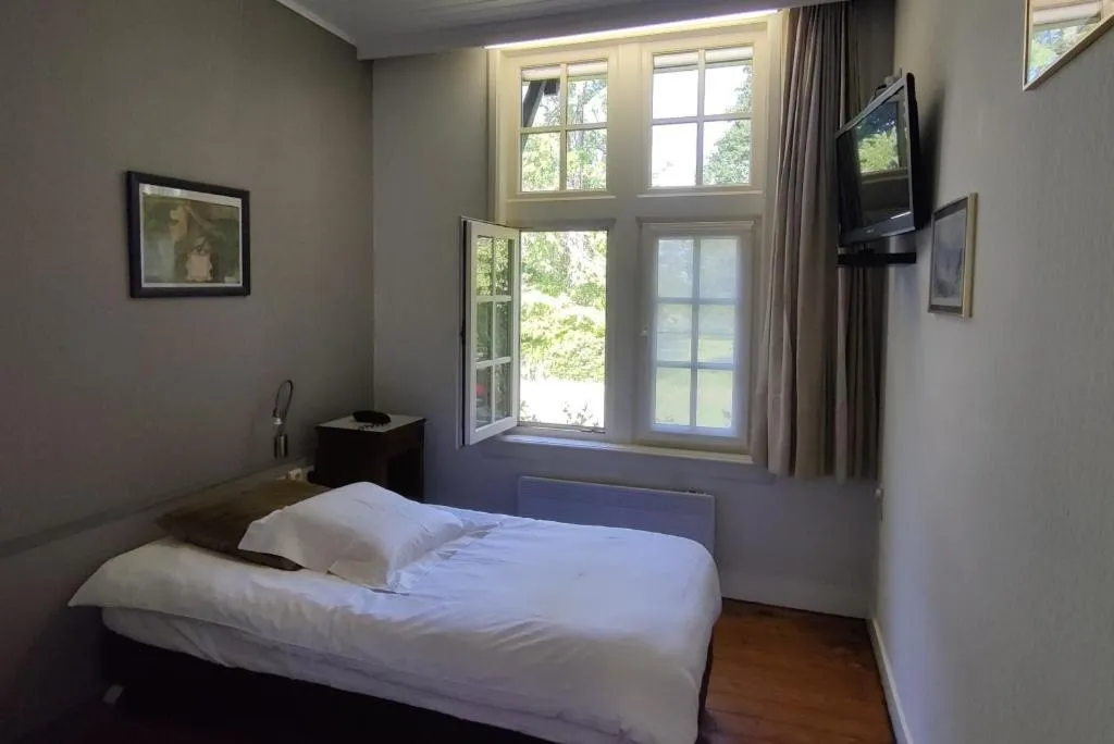 Bed in Hotel Kasteelhof 'T Hooghe