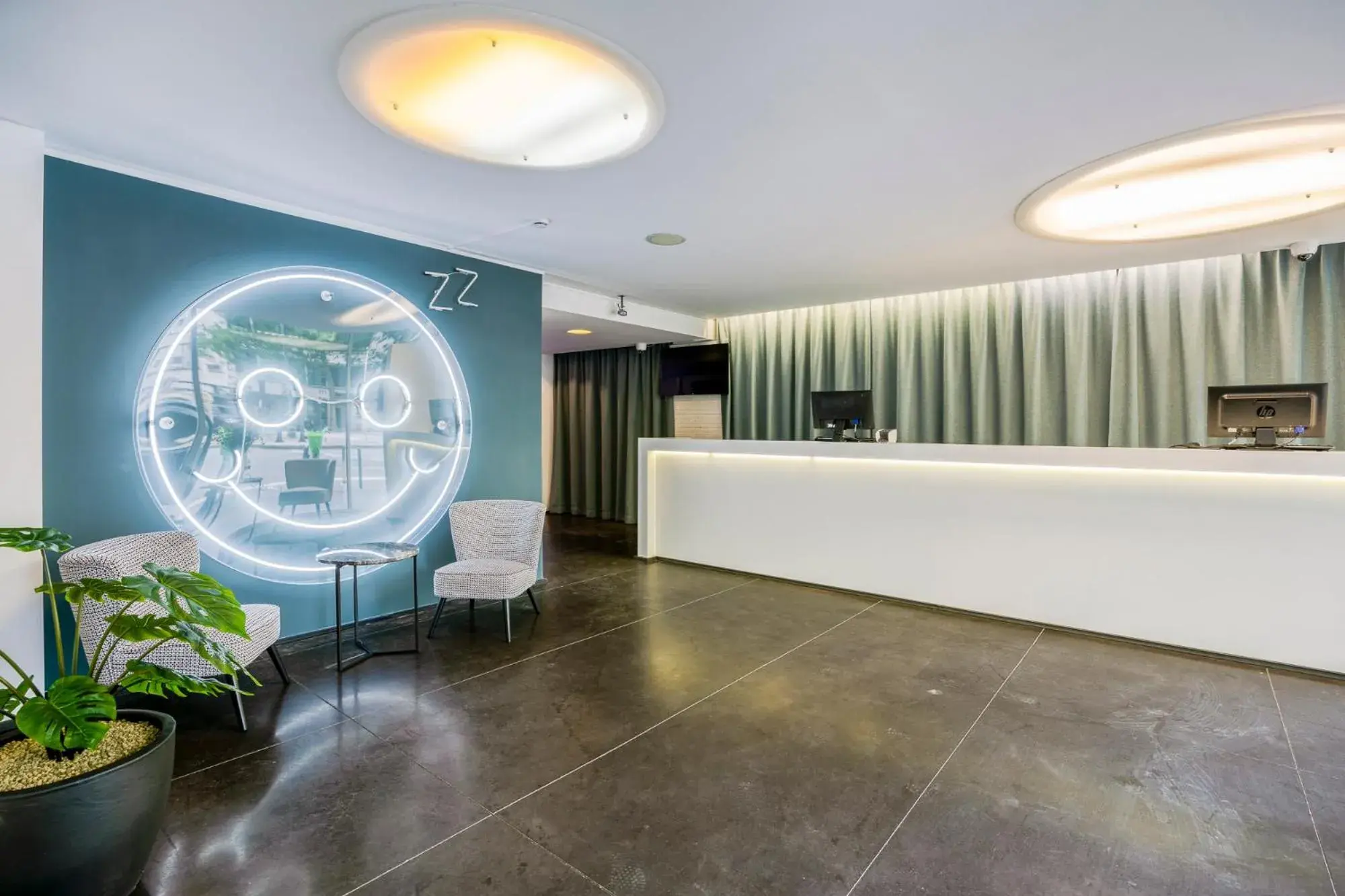 Lobby or reception in Hotel Louise Lobby or reception in Hotel Louise