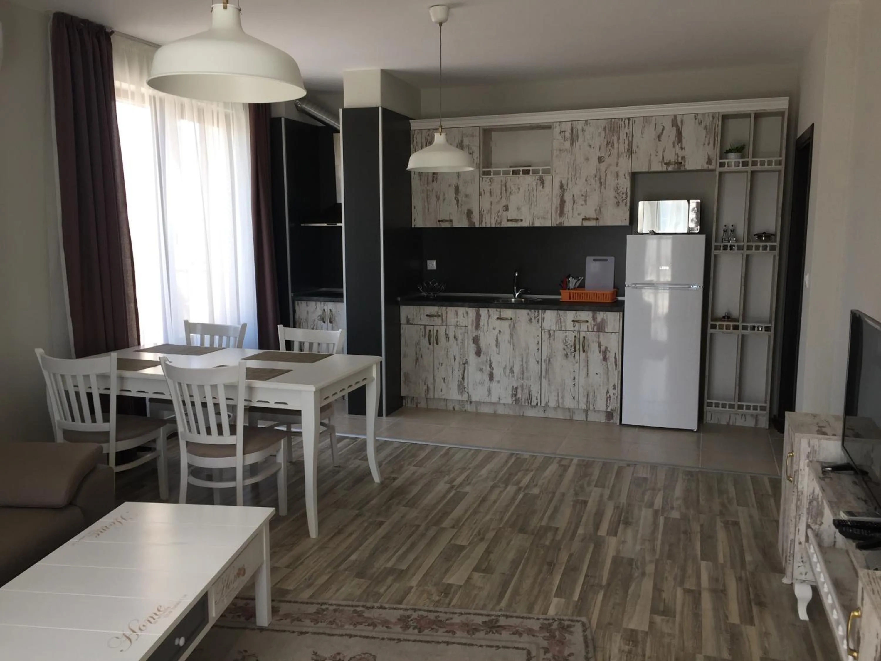 Kitchen or kitchenette in Green Paradise Deluxe Apartments