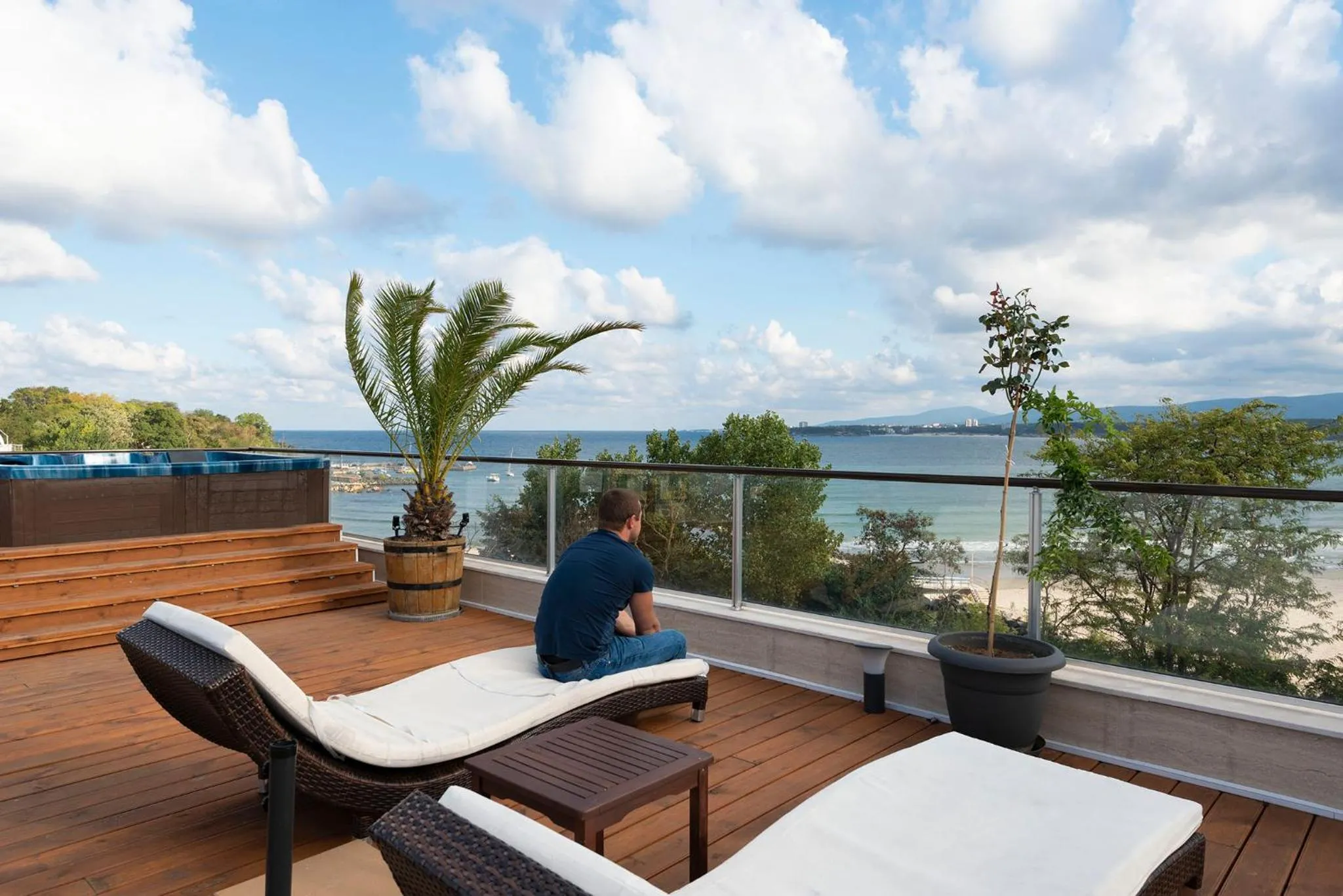 People in Green Paradise Deluxe Apartments